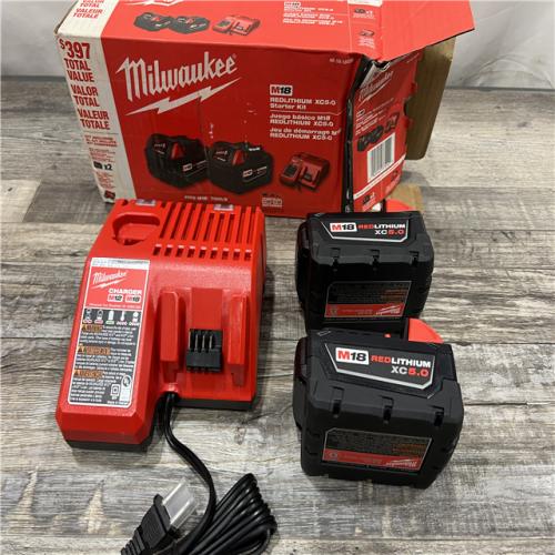 AS-IS Milwaukee M18 18-Volt Lithium-Ion XC Starter Kit with Two 5.0Ah Batteries / Charger (48-59-1852B)