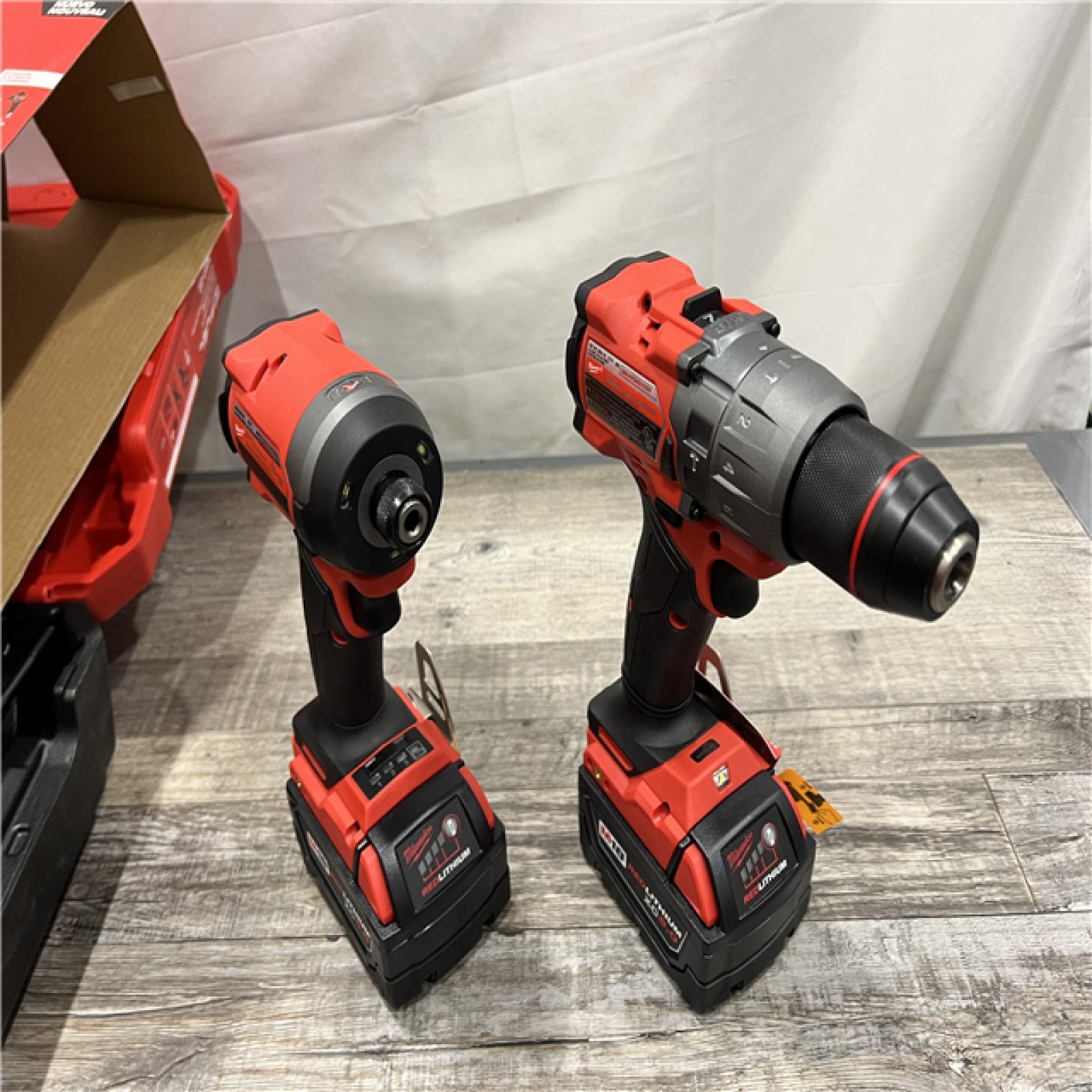 AS-IS Milwaukee M18 FUEL 18V Lithium-Ion Brushless Cordless Hammer Drill and Impact Driver Combo Kit (2-Tool) with 2 Batteries