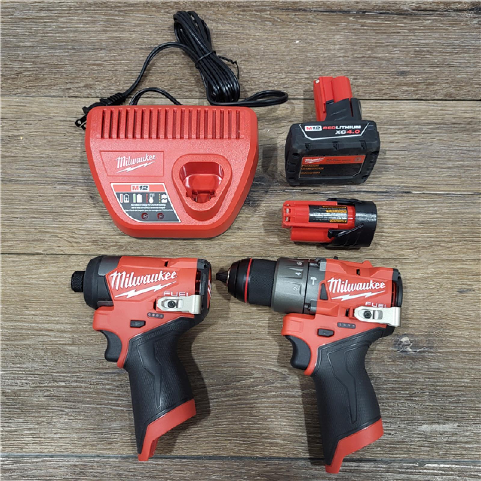 AS-IS M18 18-Volt Lithium-Ion Brushless Cordless Combo Kit (4-Tool) with 2-Batteries, 1-Charger and Tool Bag