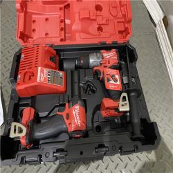 Houston location AS-IS Milwaukee 3697-22 M18 FUEL 1/2 Hammer Driller/Driver &1/4 Hex Impact Driver 2 Tool Combo  MISSING BATTERYS