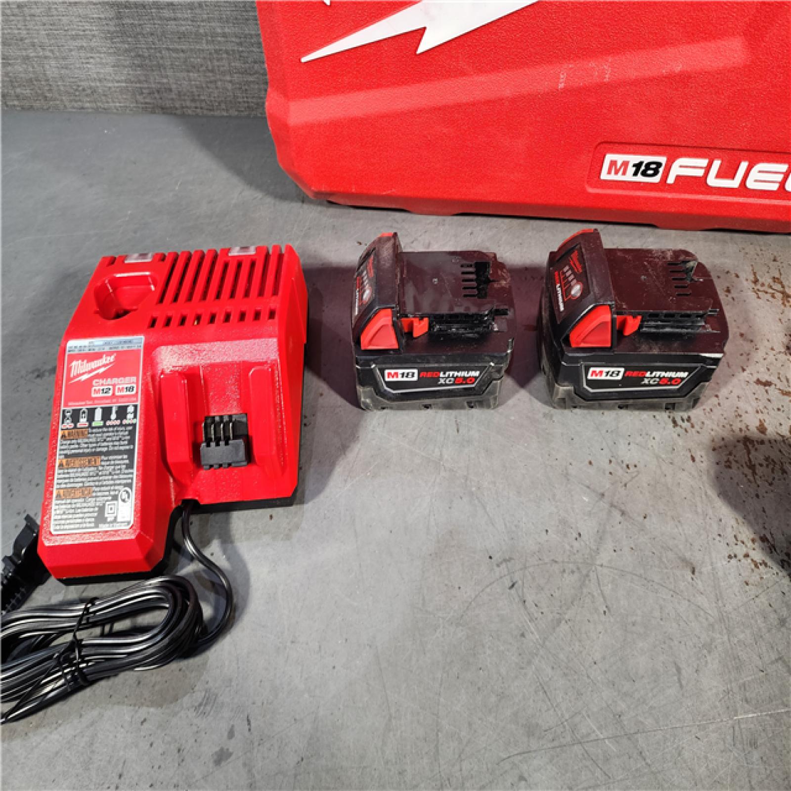 HOUSTON LOCATION - AS-IS Milwaukee M18 FUEL 18V Lithium-Ion Brushless Cordless Hammer Drill and Impact Driver Combo Kit (2-Tool) with 2 Batteries