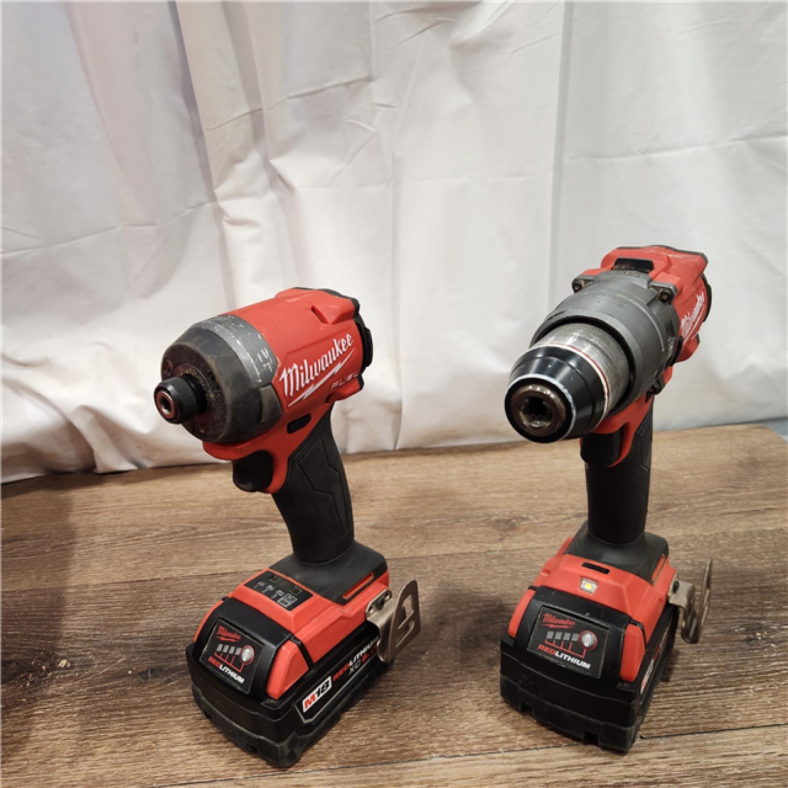 AS-IS Milwaukee M18 FUEL 18V Lithium-Ion Brushless Cordless Hammer Drill and Impact Driver Combo Kit (2-Tool) with 2 Batteries