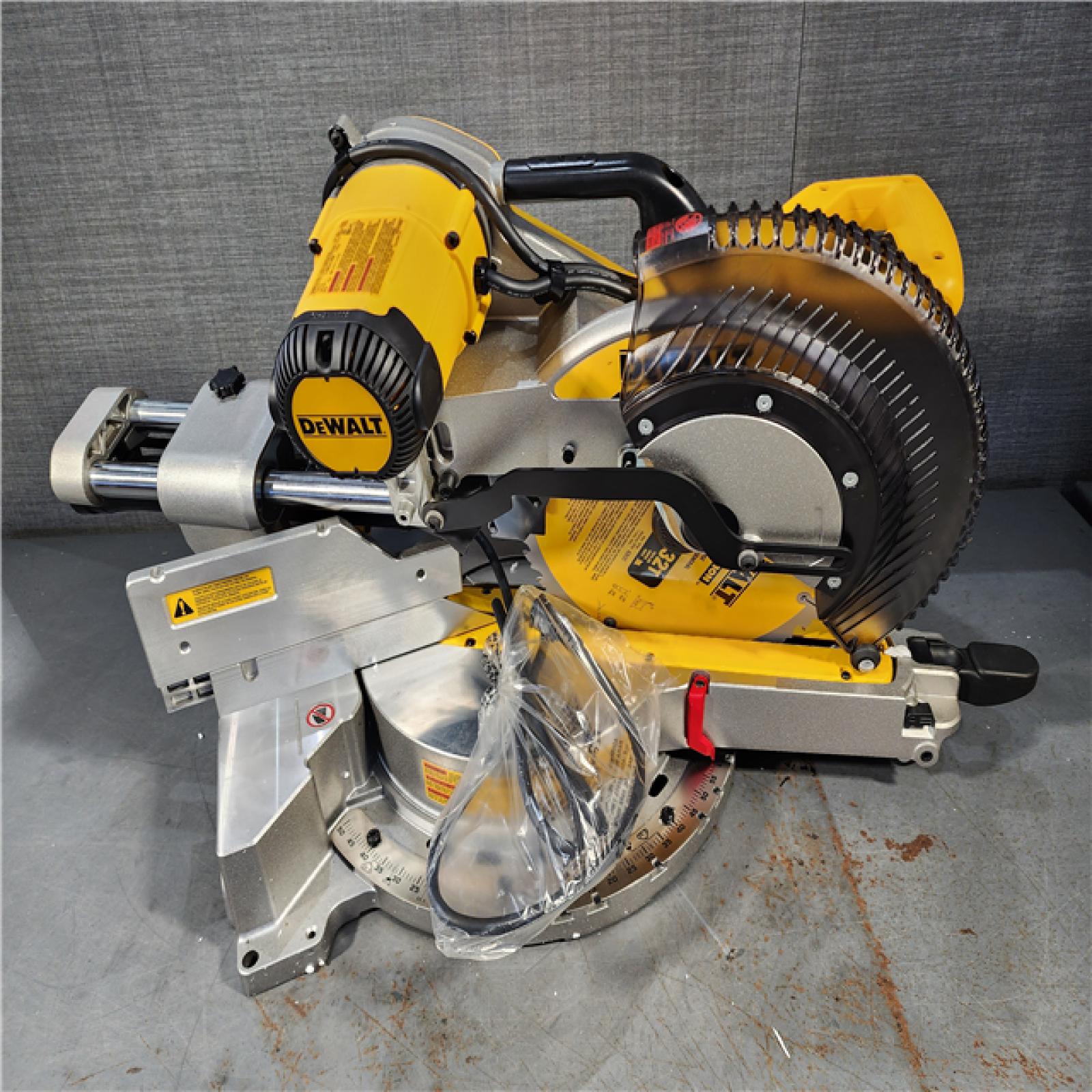 HOUSTON LOCATION - AS-IS DEWALT 15 Amp Corded 12 in. Double Bevel Sliding Compound Miter Saw, Blade Wrench and Material Clamp