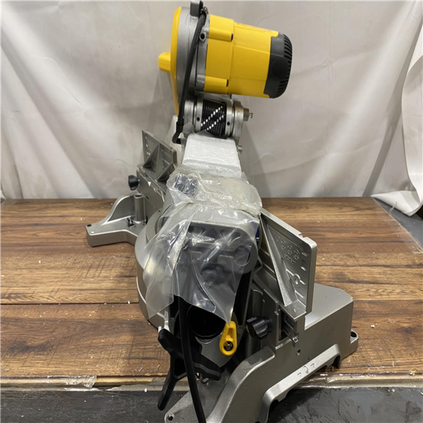 AS IS DEWALT 15 Amp Corded 12 in. Double Bevel Sliding Compound Miter Saw, Blade Wrench and Material Clamp