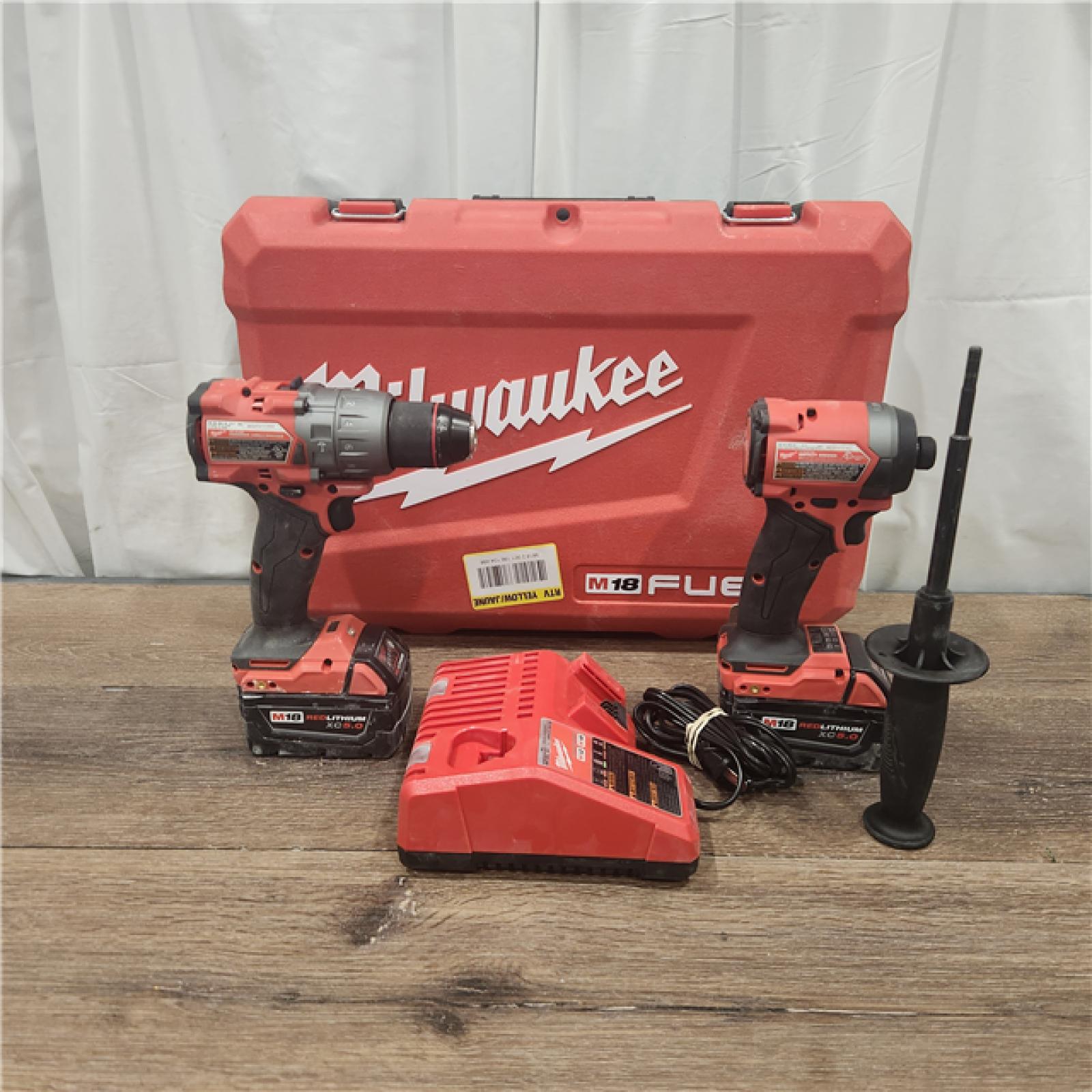 AS IS Milwaukee M18 FUEL 18V Lithium-Ion Brushless Cordless Hammer Drill and Impact Driver Combo Kit (2-Tool) with 2 Batteries