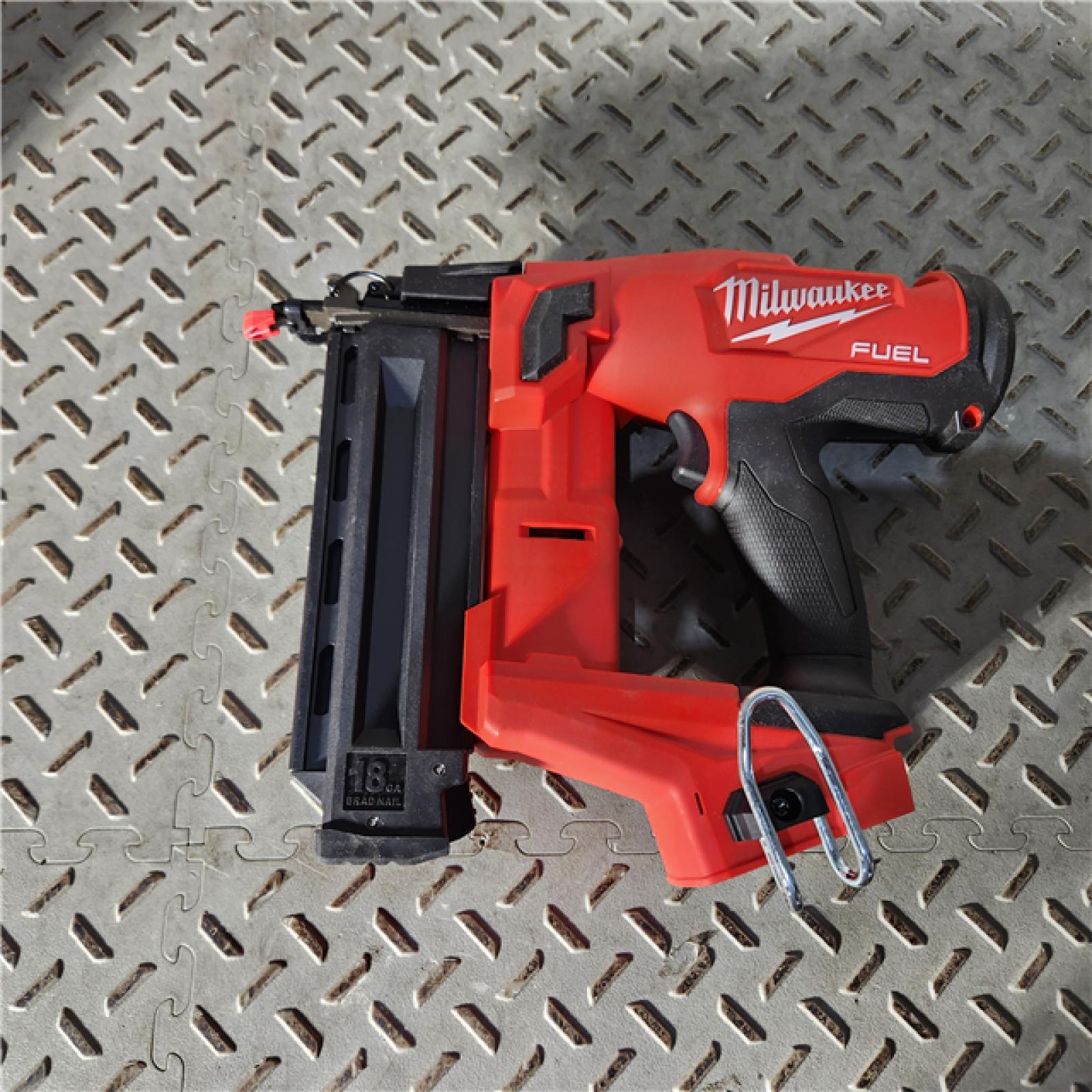 Houston location AS-IS Milwaukee M18 Fuel 18V Brushless 18-Gauge Brad Nailer 2746-20 (Bare Tool)