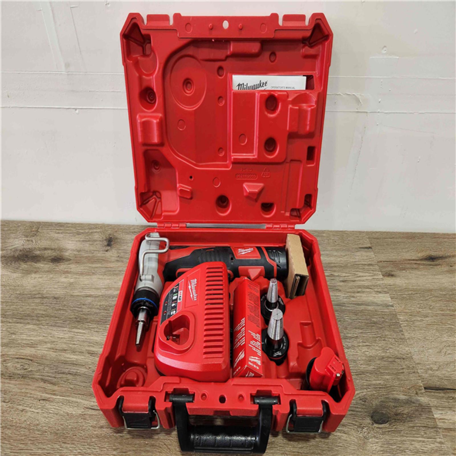 Phoenix Location Appears NEW Milwaukee M12 Cordless PEX Expansion Tool Kit with 1 in. Plastic Tubing Cutter 2474-232