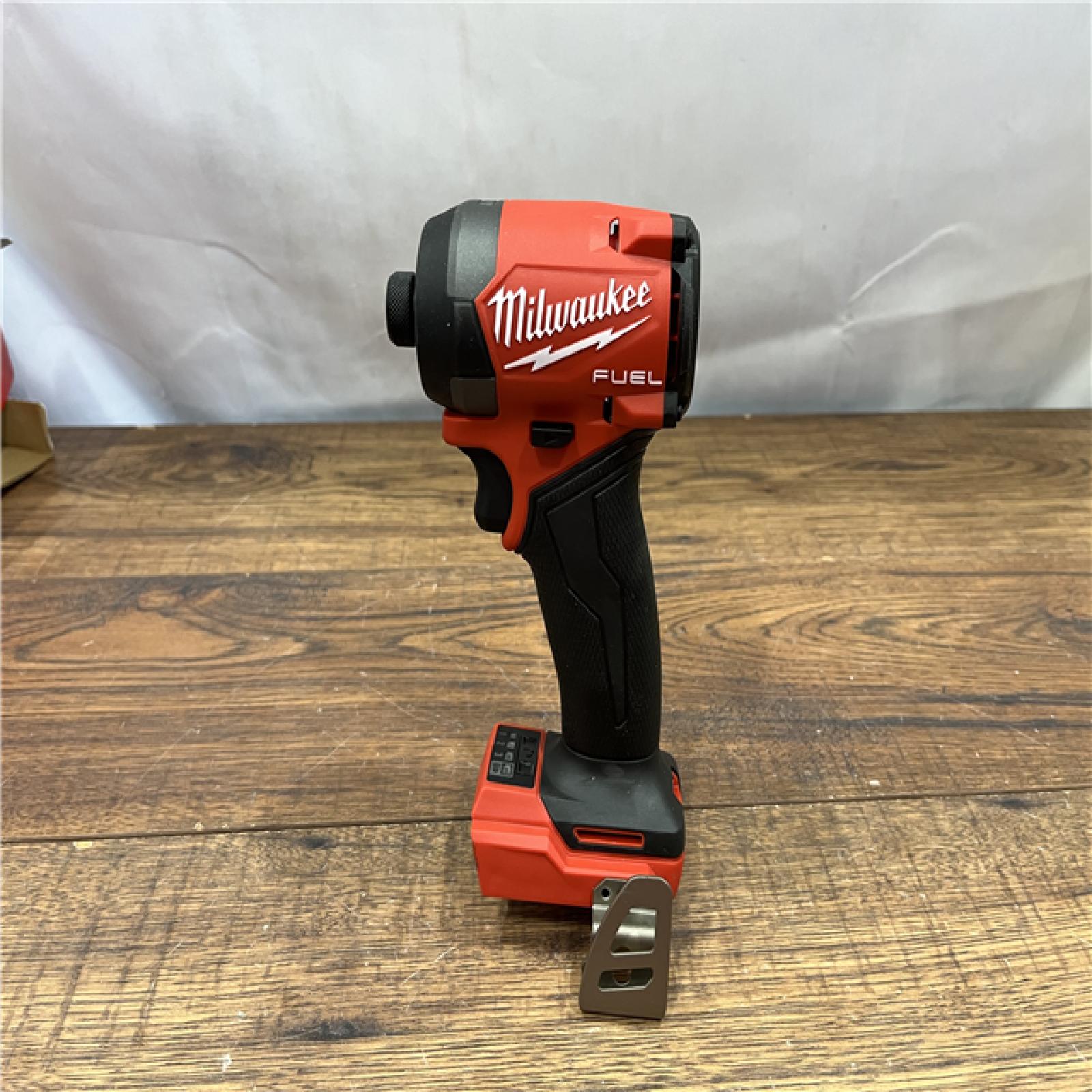 AS-IS Milwaukee 2953-20 18V Lithium-Ion Brushless Cordless 1/4   Hex Impact Driver Bare Tool  Red