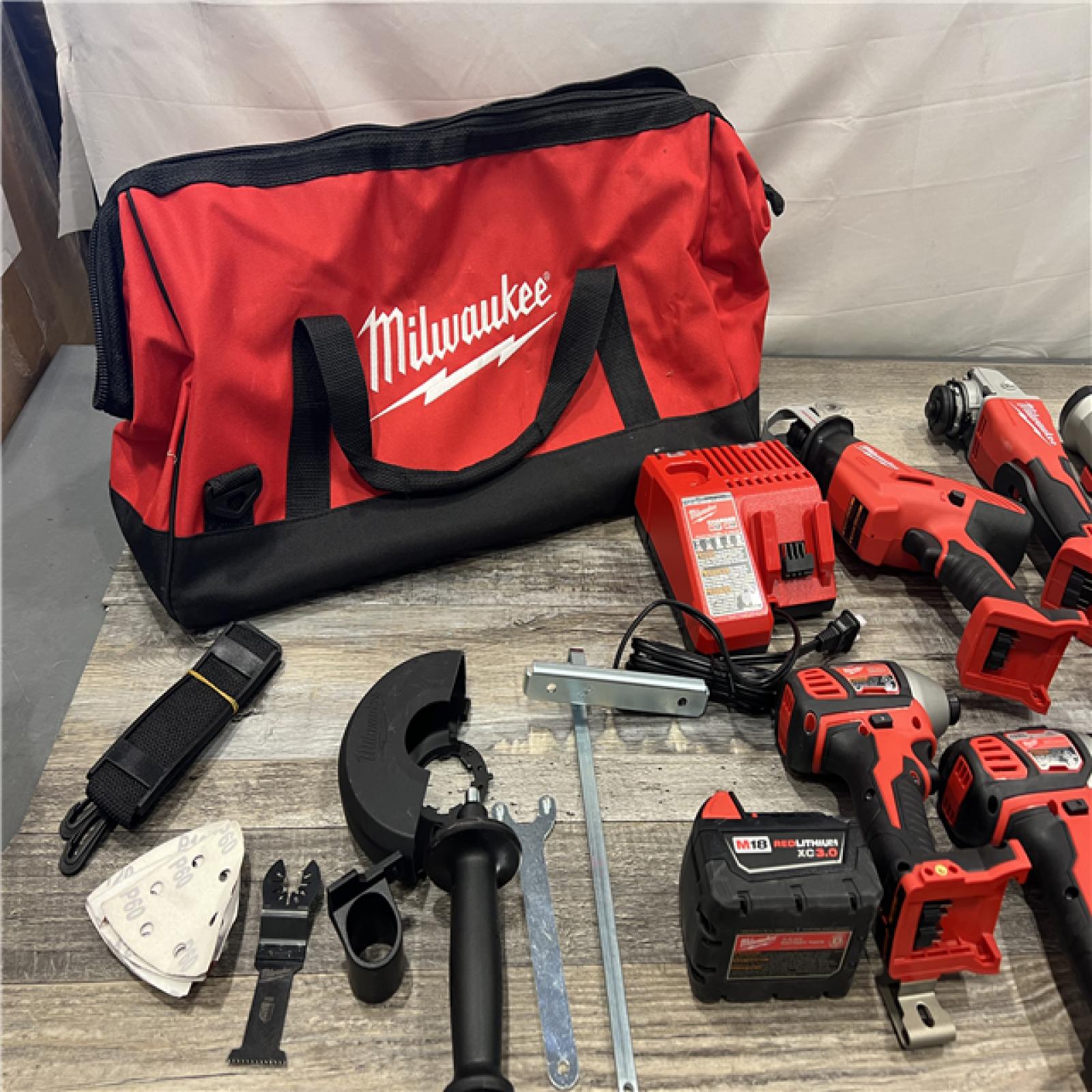 AS-IS MILWAUKEE M18 18-Volt Lithium-Ion Cordless Combo Kit 7-Tool with 2-Batteries, Charger and Tool Bag