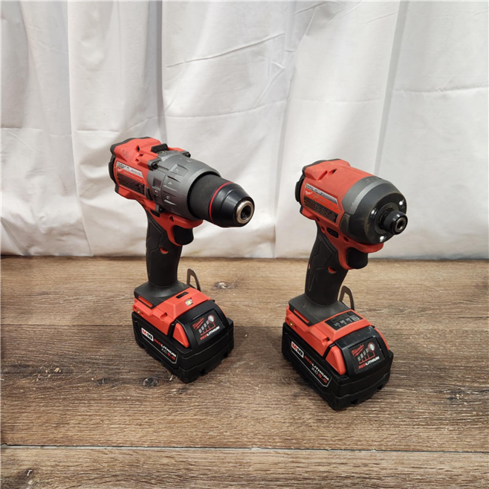 AS-IS Milwaukee M18 FUEL 18V Lithium-Ion Brushless Cordless Hammer Drill and Impact Driver Combo Kit (2-Tool) with 2 Batteries