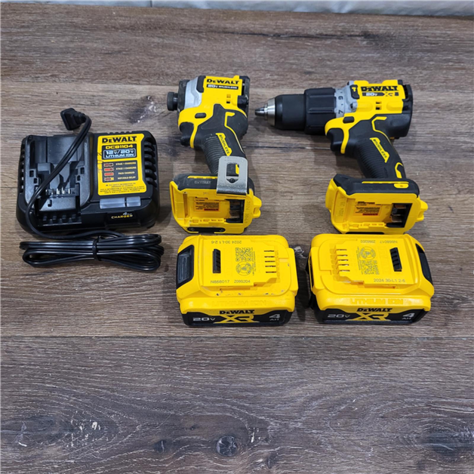 AS-IS 20V MAX XR Hammer Drill and ATOMIC Impact Driver 2 Tool Cordless Combo Kit with (2) 4.0Ah Batteries, Charger, and Bag