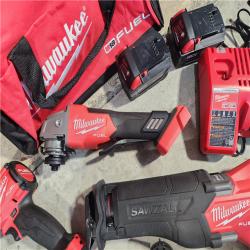 HOUSTON LOCATION - AS-IS (APPEARS LIKE NEW) Milwaukee M18 FUEL 18V Lithium-Ion Brushless Cordless Combo Kit with Two 5.0 Ah Batteries  1 Charger  2 Tool Bags (7-Tool)