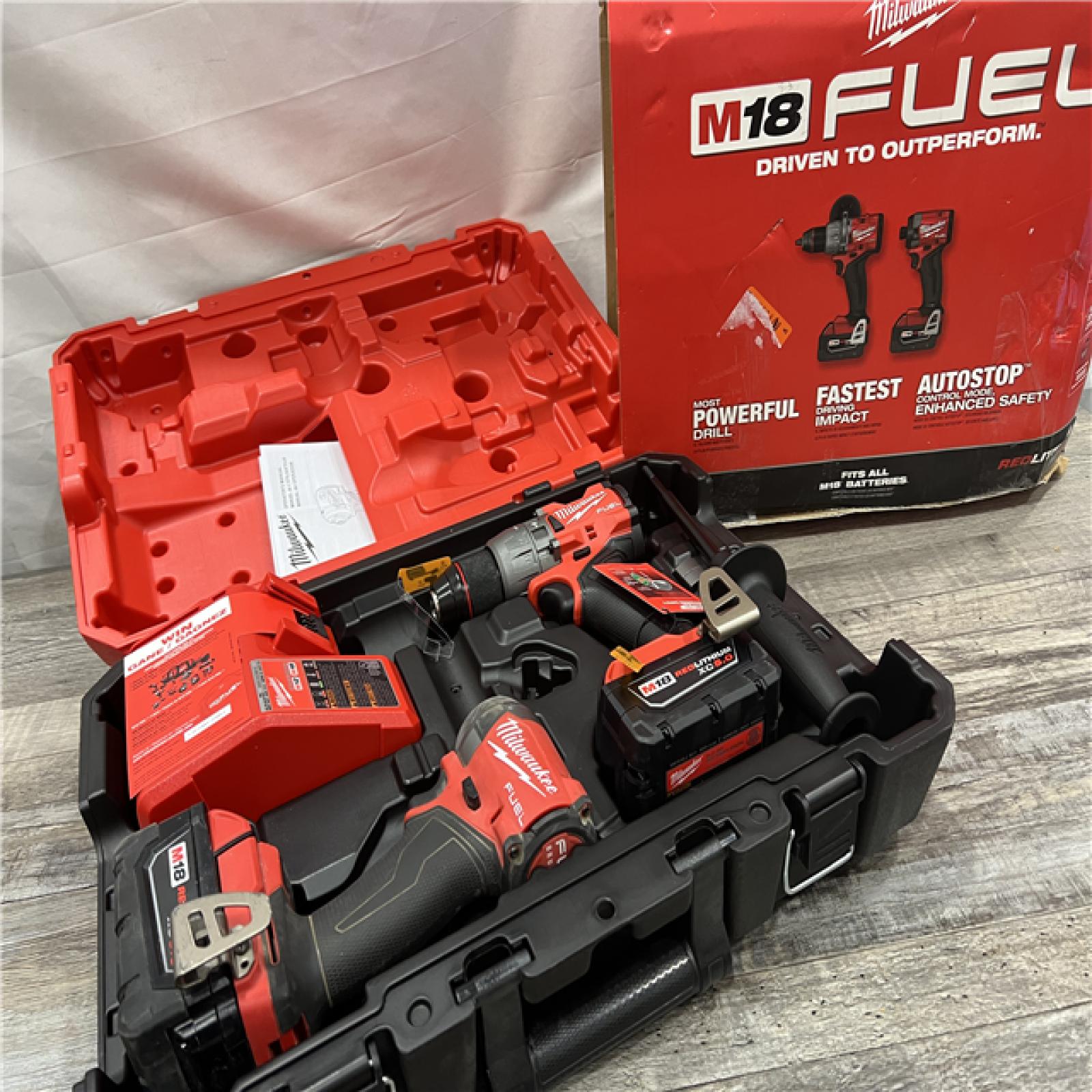 AS-IS MILWAUKEE M18 FUEL 18V Lithium-Ion Brushless Cordless Hammer Drill and Impact Driver Combo Kit (2-Tool) with 2 Batteries