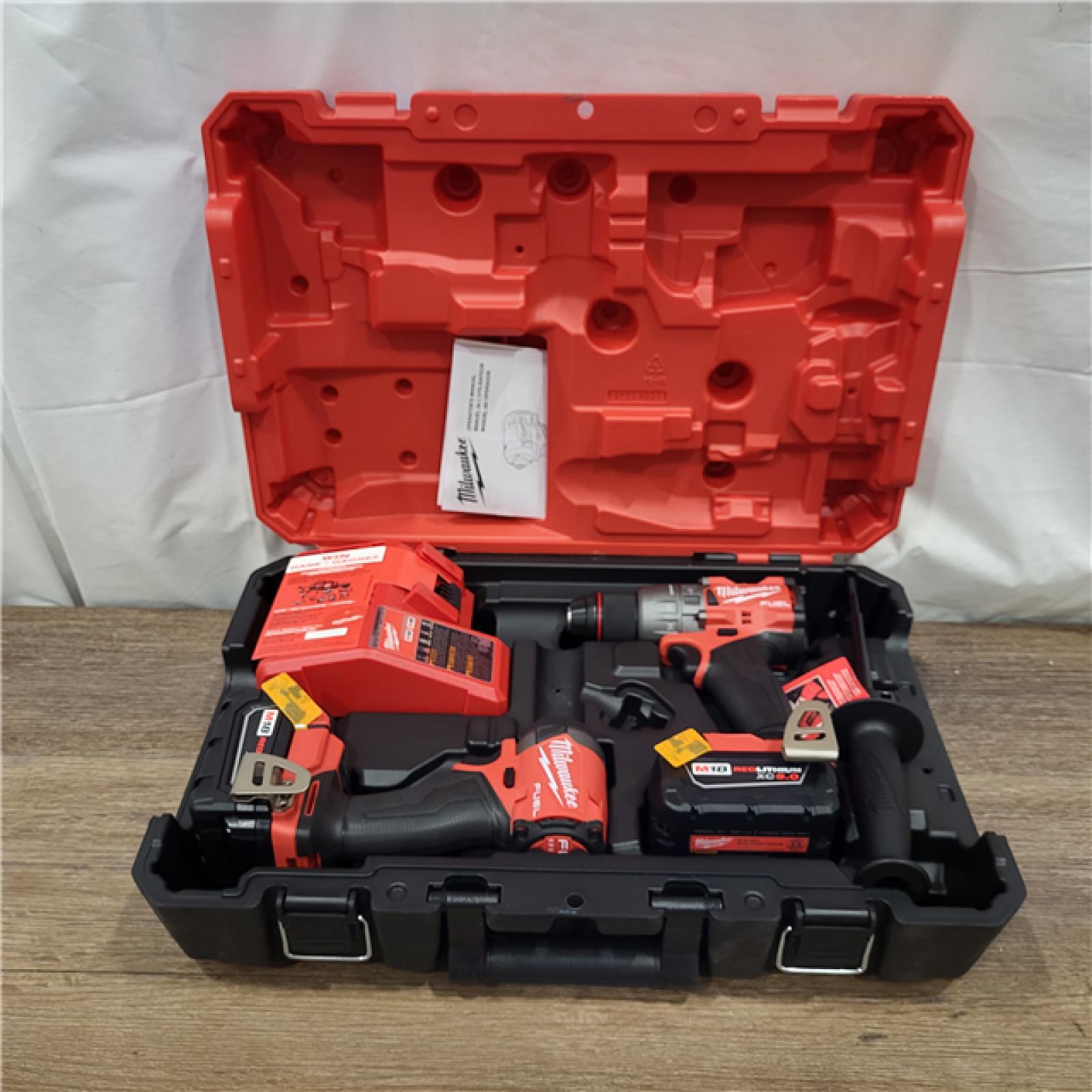 AS-IS M18 FUEL 18V Lithium-Ion Brushless Cordless Hammer Drill and Impact Driver Combo Kit (2-Tool) with 2 Batteries