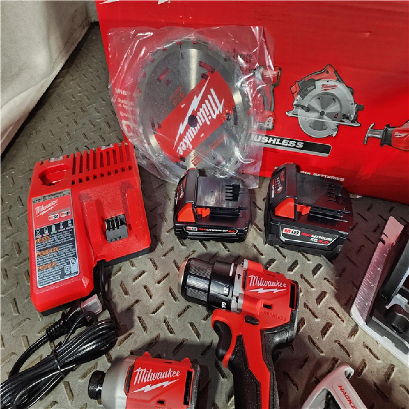 HOUSTON LOCATION - AS-IS (APPEARS LIKE NEW) Milwaukee M18 18-Volt Lithium-Ion Brushless Cordless Combo Kit (4-Tool) with 2-Batteries, 1-Charger and Tool Bag