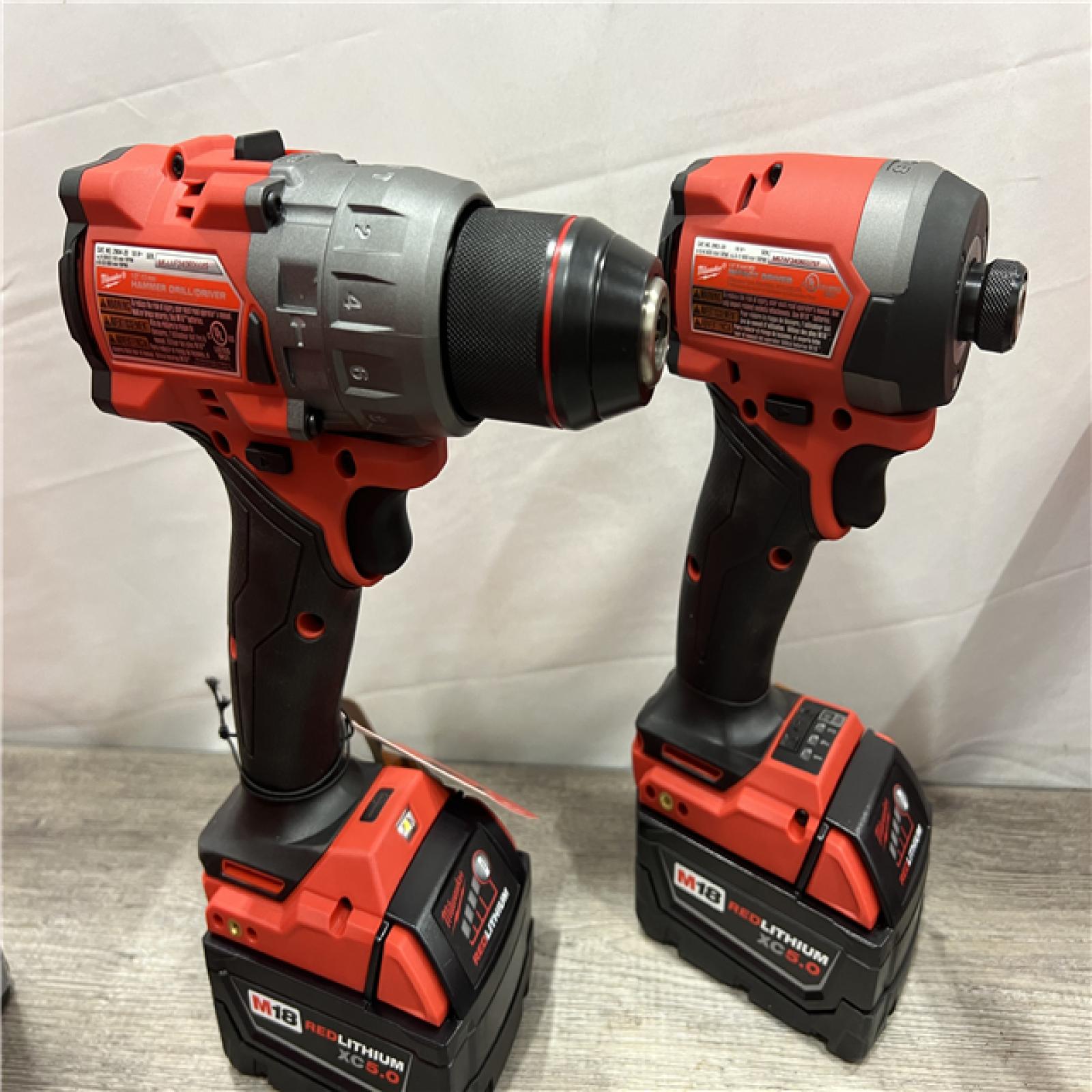 AS-IS MILWAUKEE M18 FUEL 18V Lithium-Ion Brushless Cordless Hammer Drill and Impact Driver Combo Kit (2-Tool) with 2 Batteries