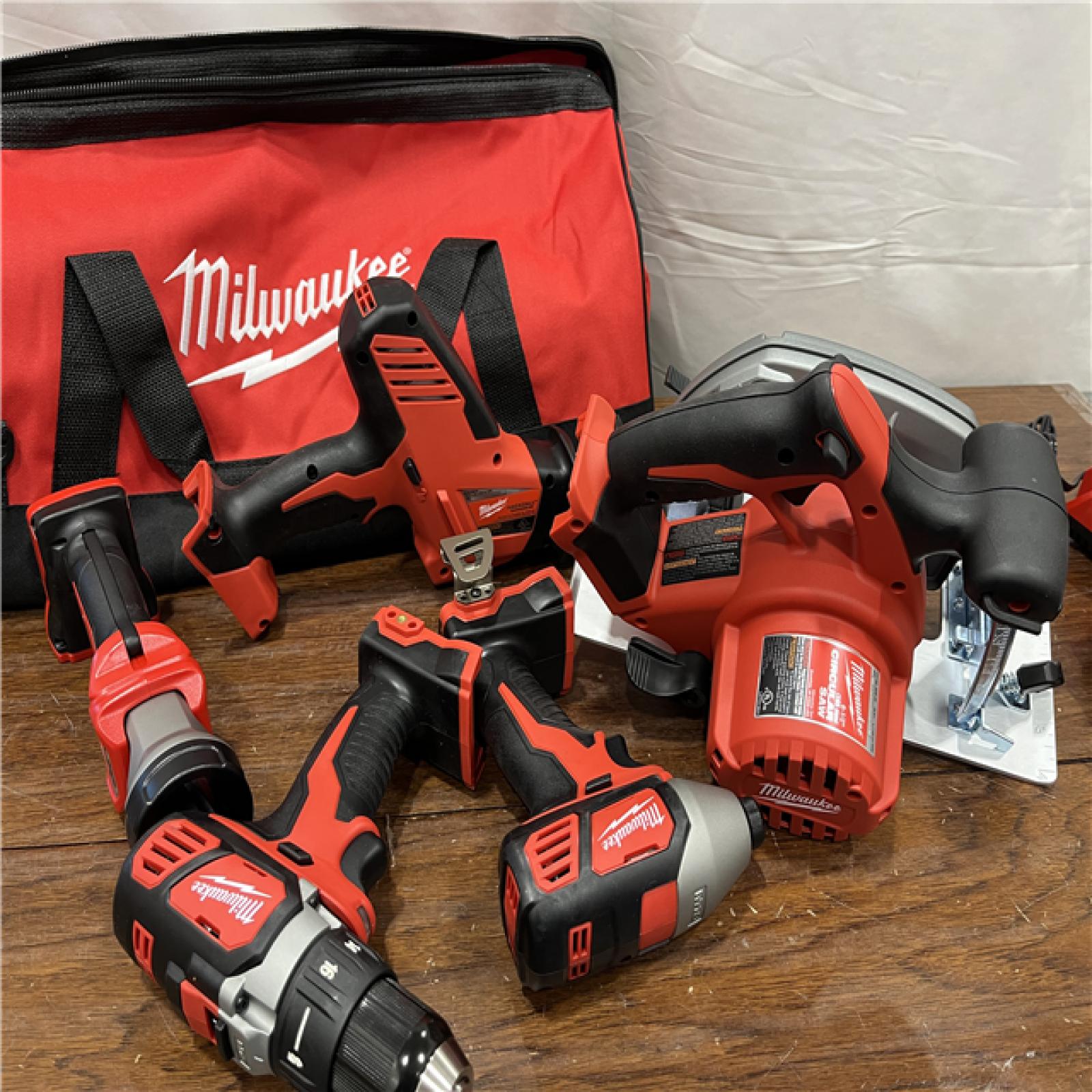 AS-IS M18 18V Lithium-Ion Cordless Combo Kit (5-Tool) with (1) 3.0Ah and (1) 1.5Ah Battery, (1) Charger, (1) Tool Bag