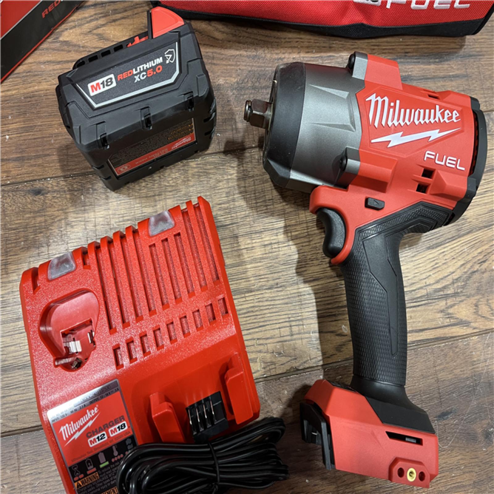 AS-IS Milwaukee M18 1/2 in. Cordless Brushless High Torque Impact Wrench Kit (Battery & Charger)