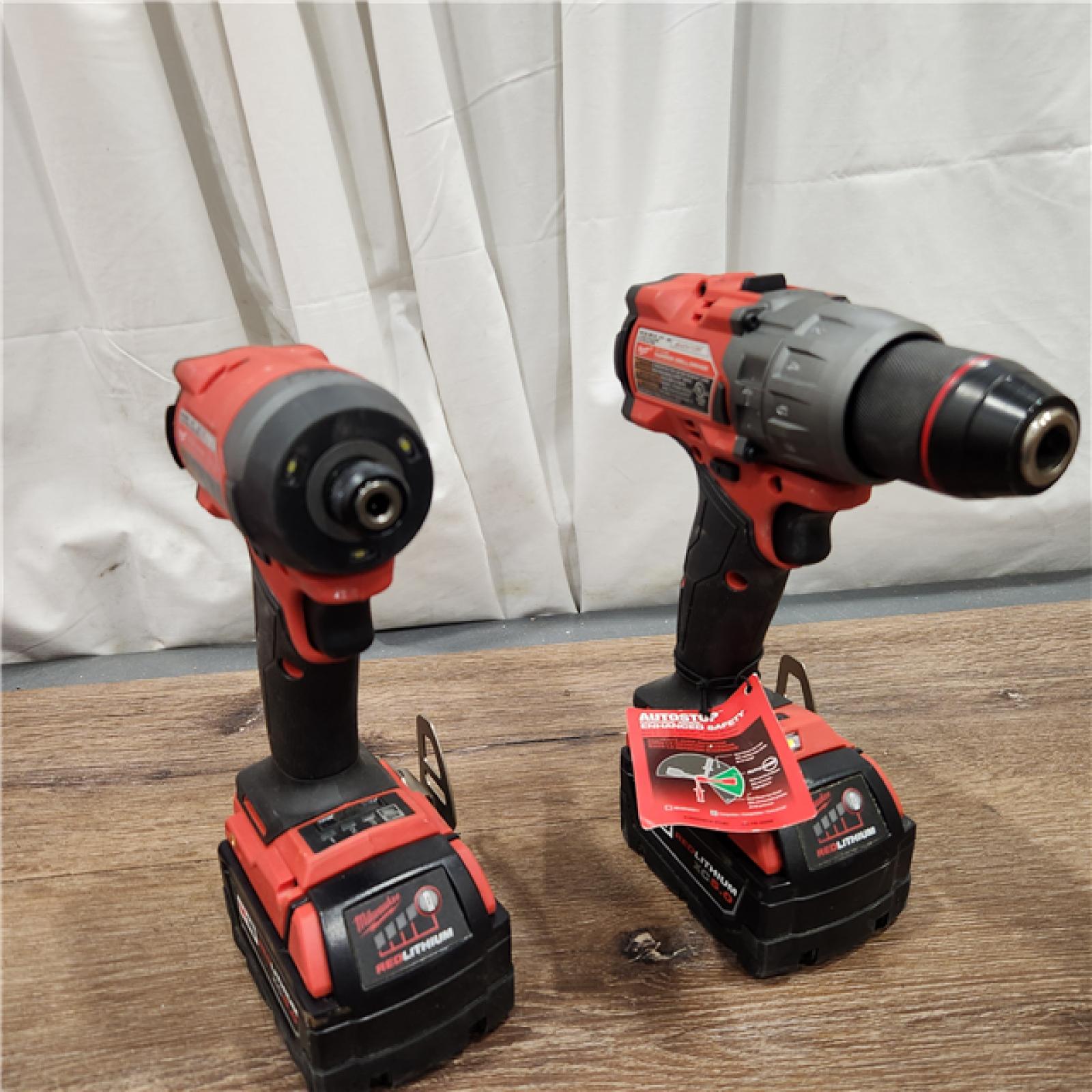 AS-IS Milwaukee M18 FUEL 18V Lithium-Ion Brushless Cordless Hammer Drill and Impact Driver Combo Kit (2-Tool) with 2 Batteries