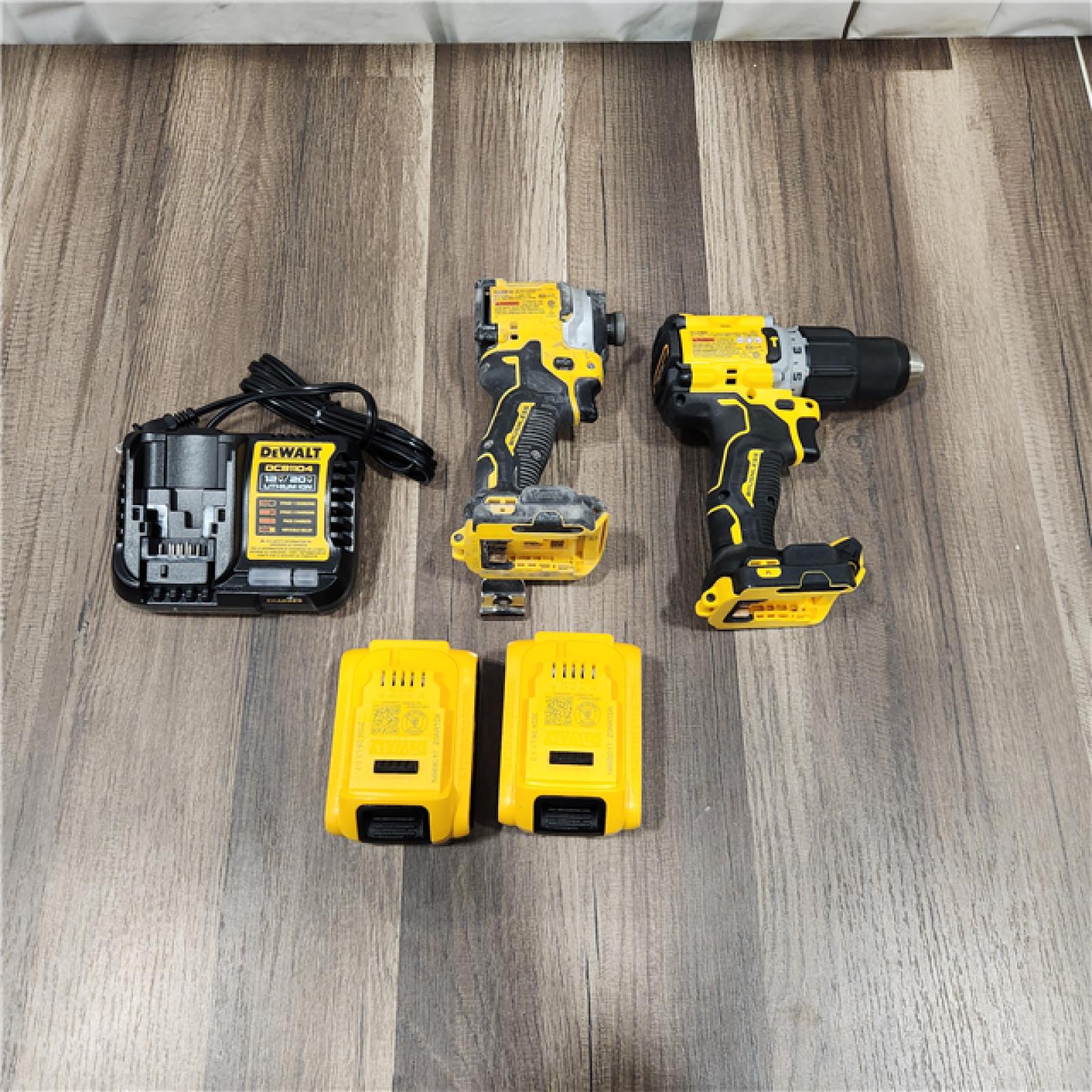 AS IS DEWALT 20V MAX XR Hammer Drill and ATOMIC Impact Driver 2 Tool Cordless Combo Kit with (2) 4.0Ah Batteries, Charger, and Bag