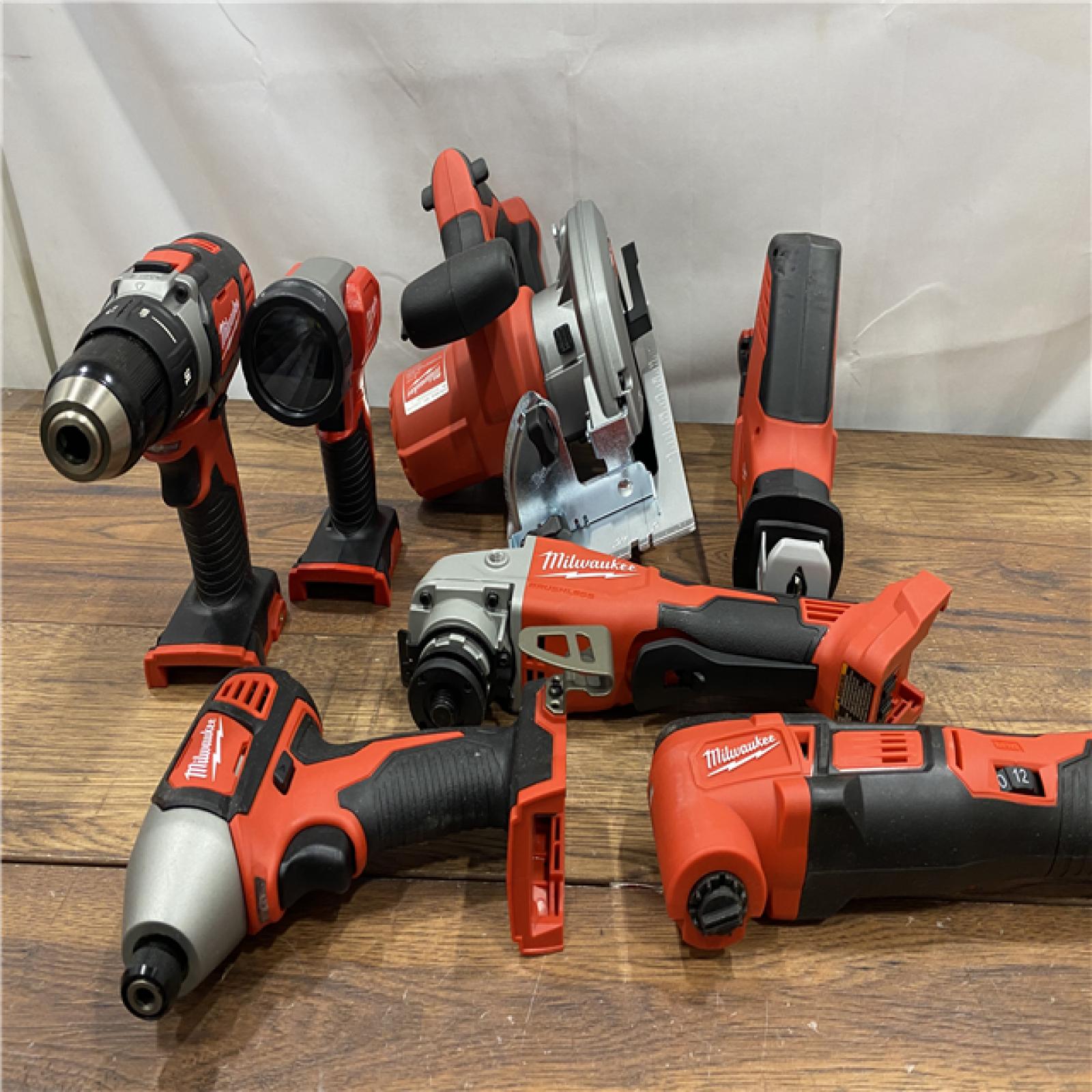 AS IS Milwaukee M18 18-Volt Lithium-Ion Cordless Combo Kit 7-Tool with 2-Batteries, Charger and Tool Bag