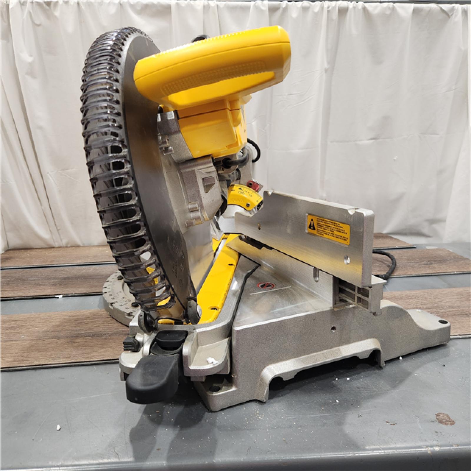 AS IS DEWALT 15 Amp Corded 12 in. Double Bevel Sliding Compound Miter Saw with XPS Technology, Blade Wrench and Material Clamp