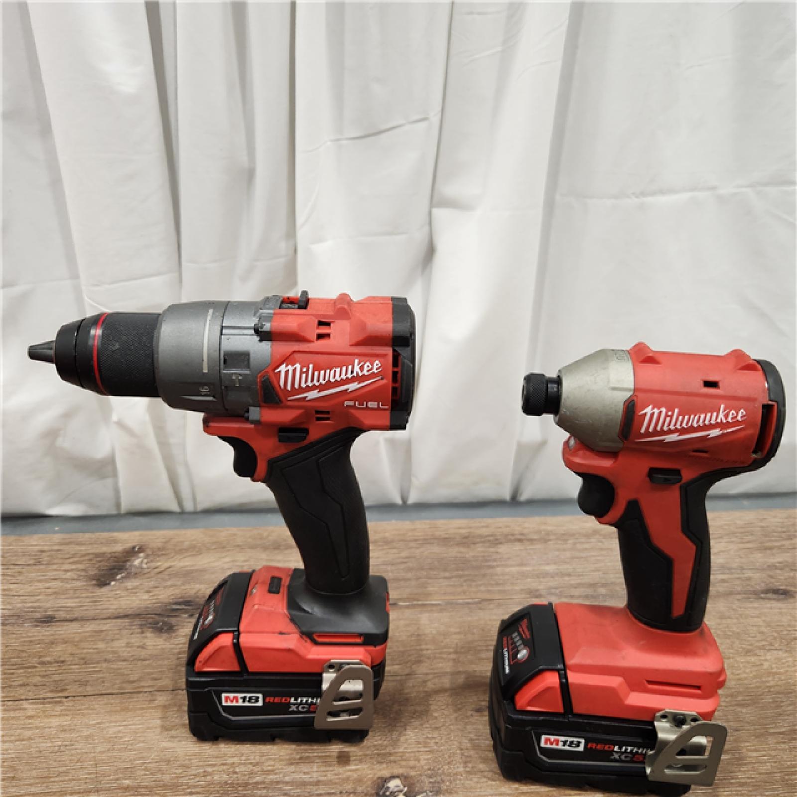 AS-IS Milwaukee M18 FUEL 18V Lithium-Ion Brushless Cordless Hammer Drill and Impact Driver Combo Kit (2-Tool) with 2 Batteries