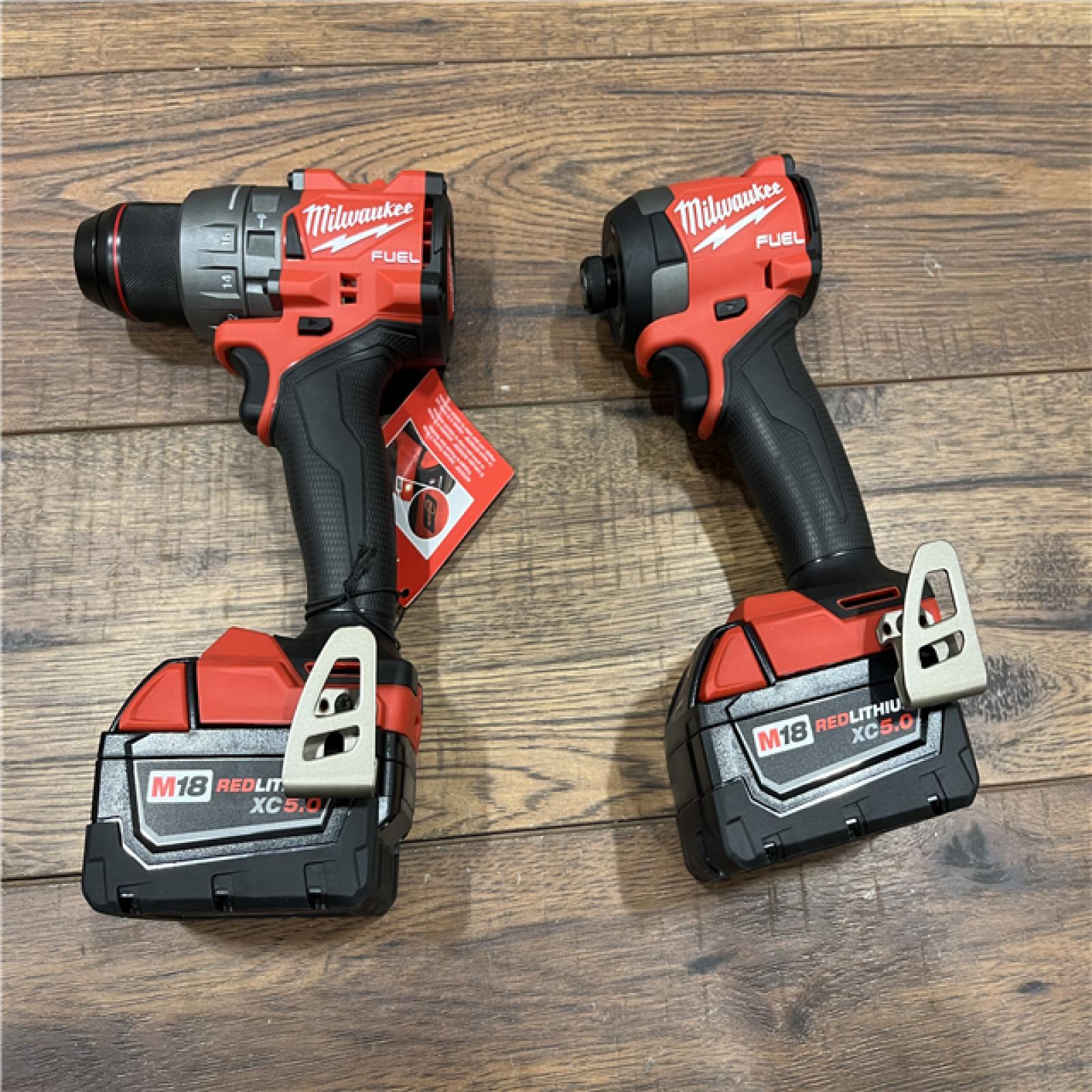 AS-IS Milwaukee M18 FUEL 18V Lithium-Ion Brushless Cordless Hammer Drill and Impact Driver Combo Kit (2-Tool) with 2 Batteries