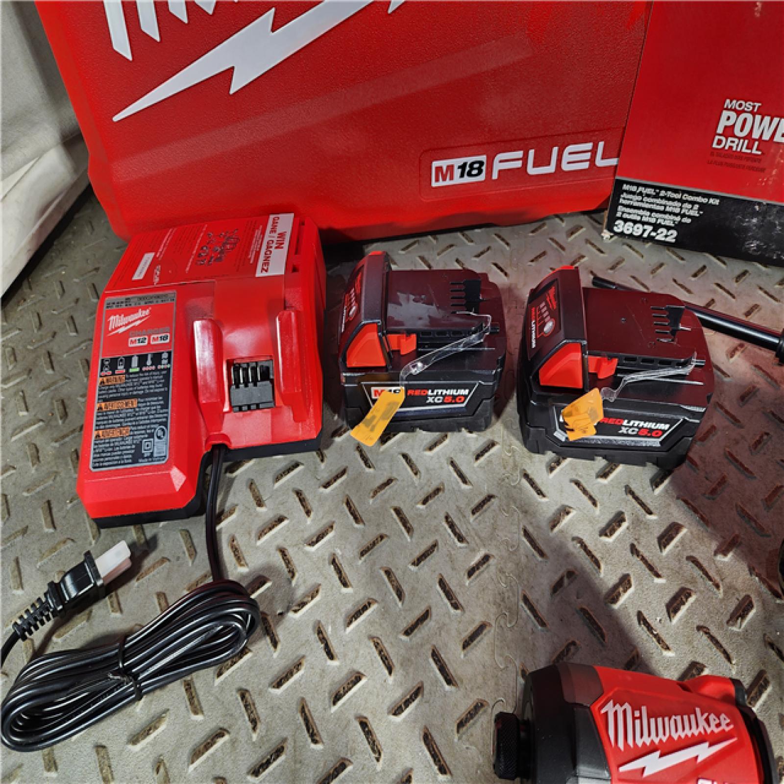 HOUSTON LOCATION - AS-IS (APPEARS LIKE NEW) Milwaukee M18 FUEL 18V Lithium-Ion Brushless Cordless Hammer Drill and Impact Driver Combo Kit (2-Tool) with 2 Batteries