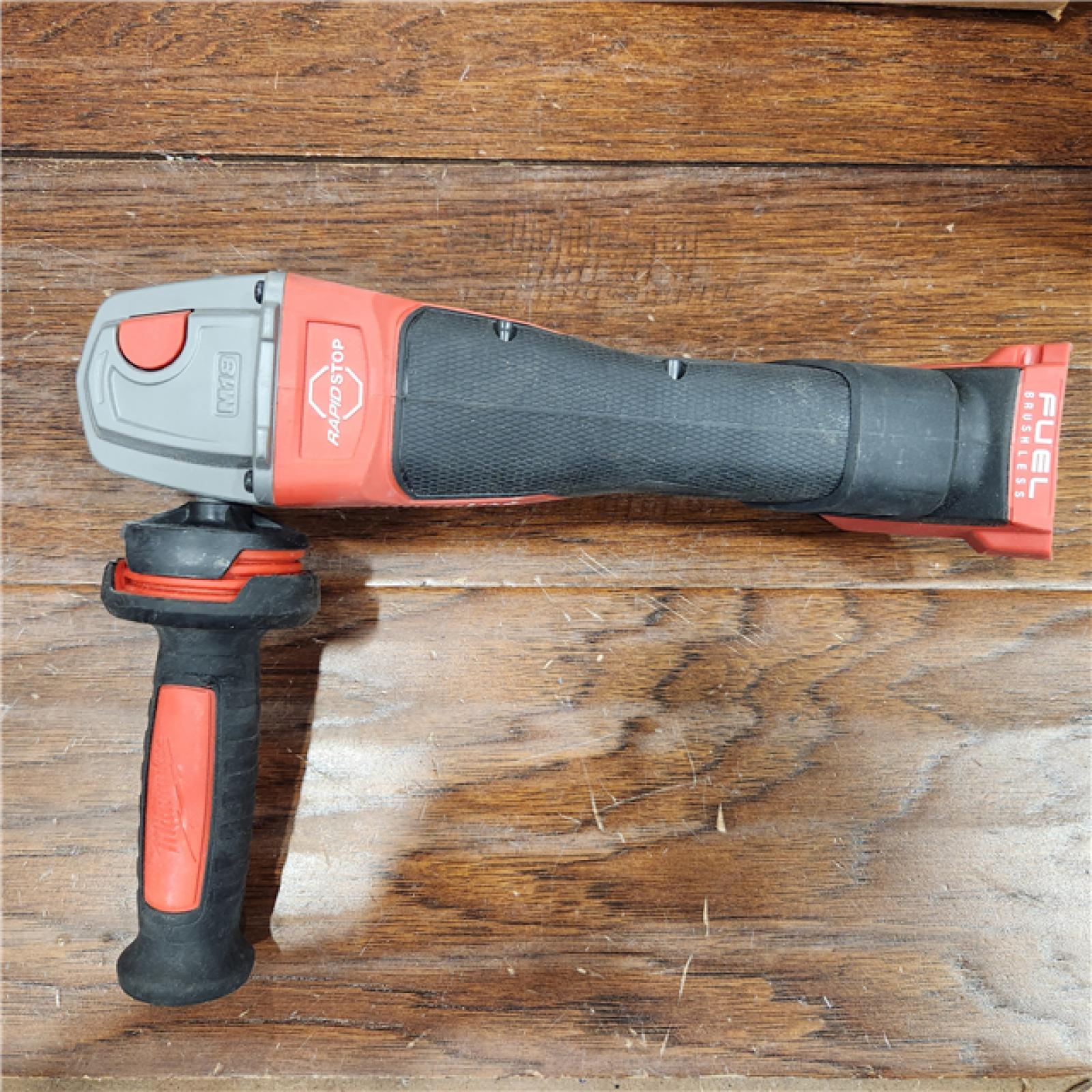 AS-IS Milwaukee 2880-20 M18 FUEL 18-Volt Lithium-Ion Brushless Cordless 4-1/2 in./5 in. Grinder W/Paddle Switch (Tool-Only)