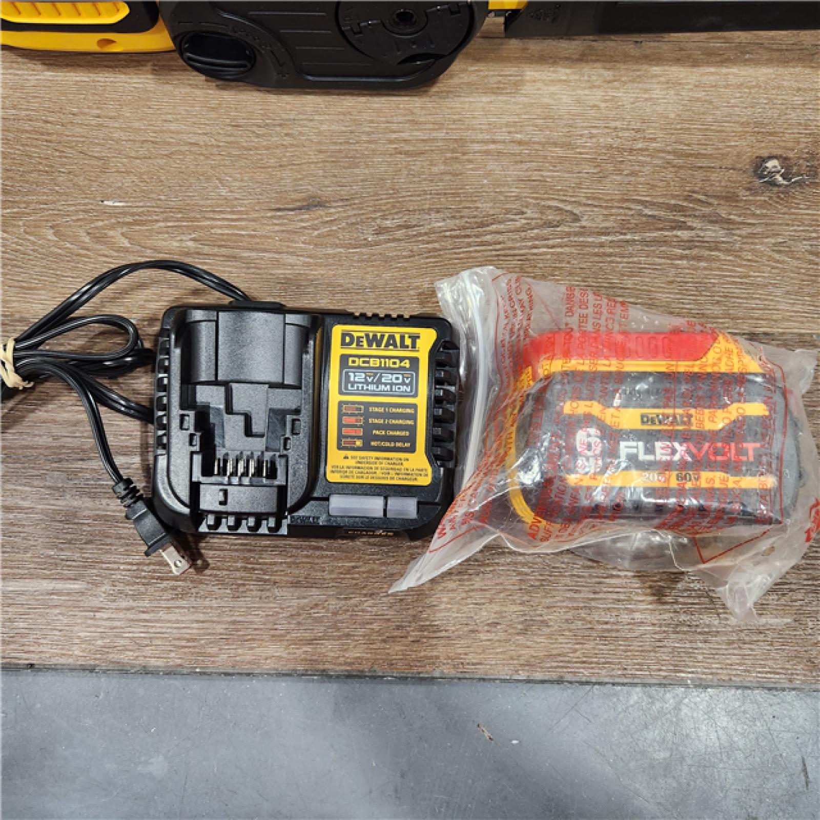 AS-IS DEWALT  FLEXVOLT 60V MAX 16in. Brushless Cordless Battery Powered Chainsaw Kit with (1) FLEXVOLT 2 Ah Battery & Charger