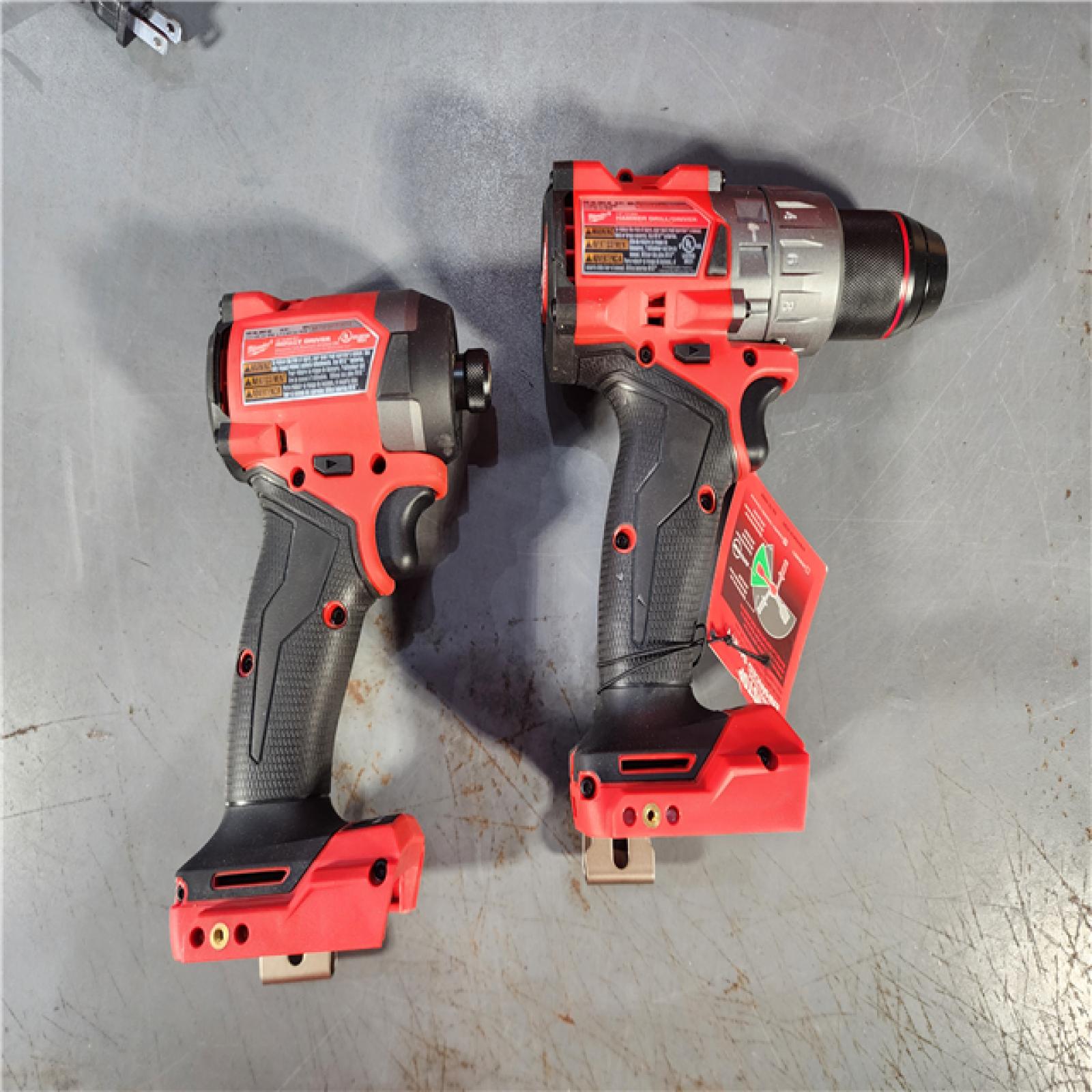 HOUSTON LOCATION - AS-IS (APPEARS LIKE NEW) Milwaukee M18 FUEL 18V Lithium-Ion Brushless Cordless Hammer Drill and Impact Driver Combo Kit (2-Tool) with 2 Batteries