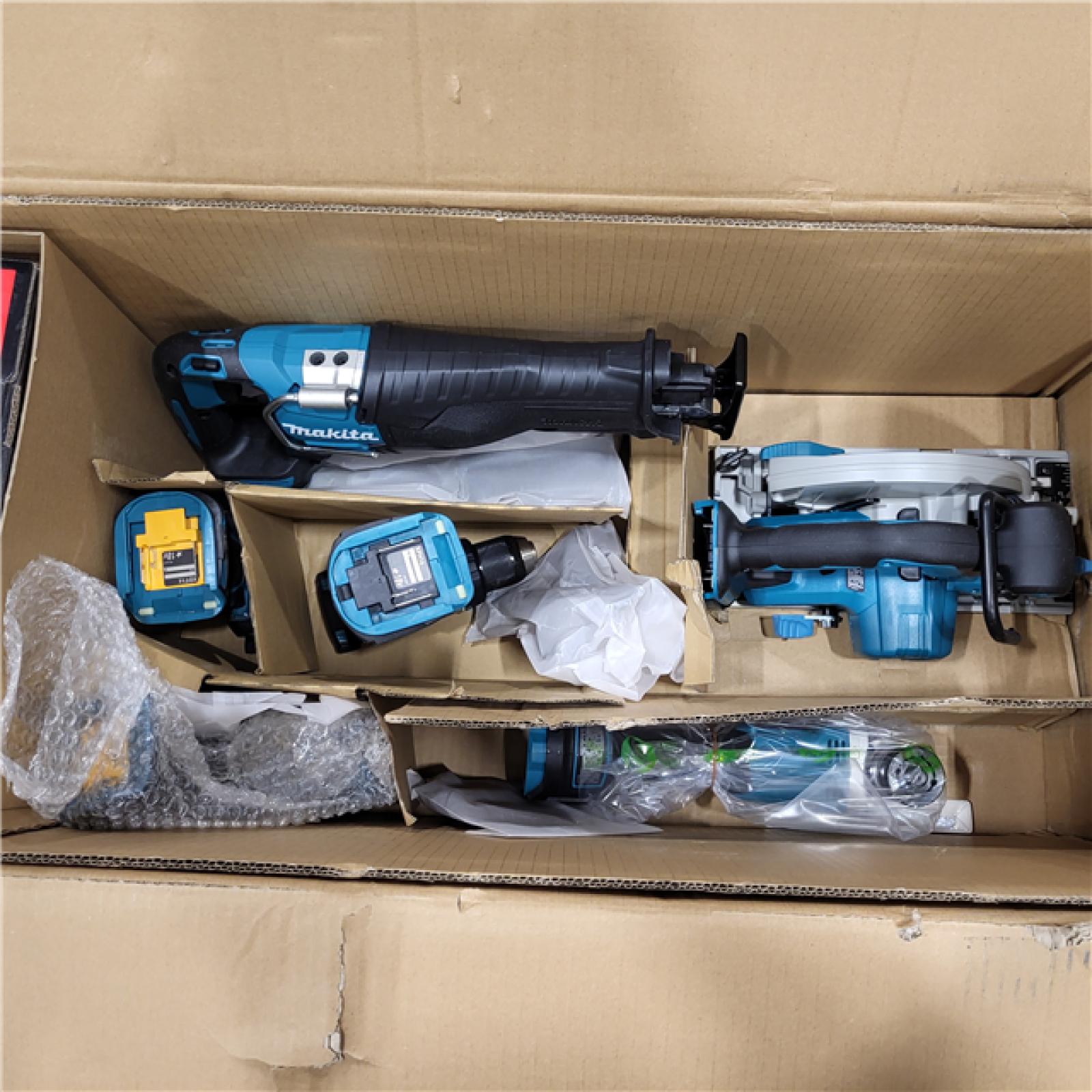 AS-IS 18V 5.0Ah LXT Brushless 7-Piece Kit(Hammer Driver-Drill, Impact Driver, ReciproSaw, Circ Saw, Grinder, Radio, Light)