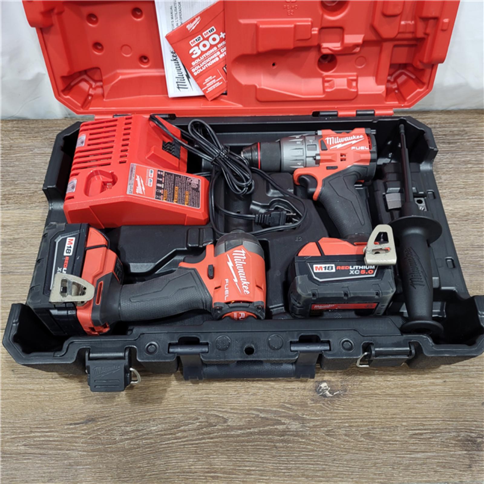 AS-IS M18 FUEL 18V Lithium-Ion Brushless Cordless Hammer Drill and Impact Driver Combo Kit (2-Tool) with 2 Batteries