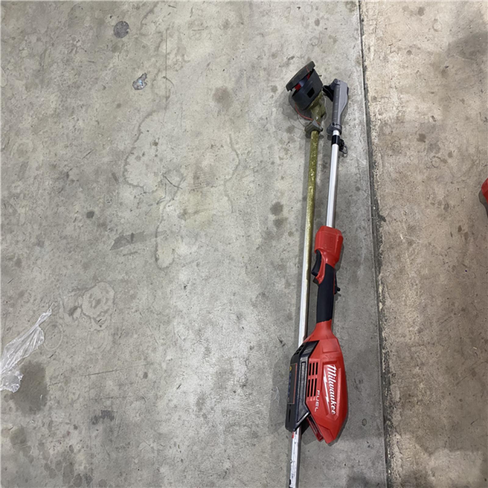 Houston location AS-IS MILWAUKEE M18 FUEL 18V Lithium-Ion Cordless Brushless String Grass Trimmer with Attachment Capability (Tool-Only)