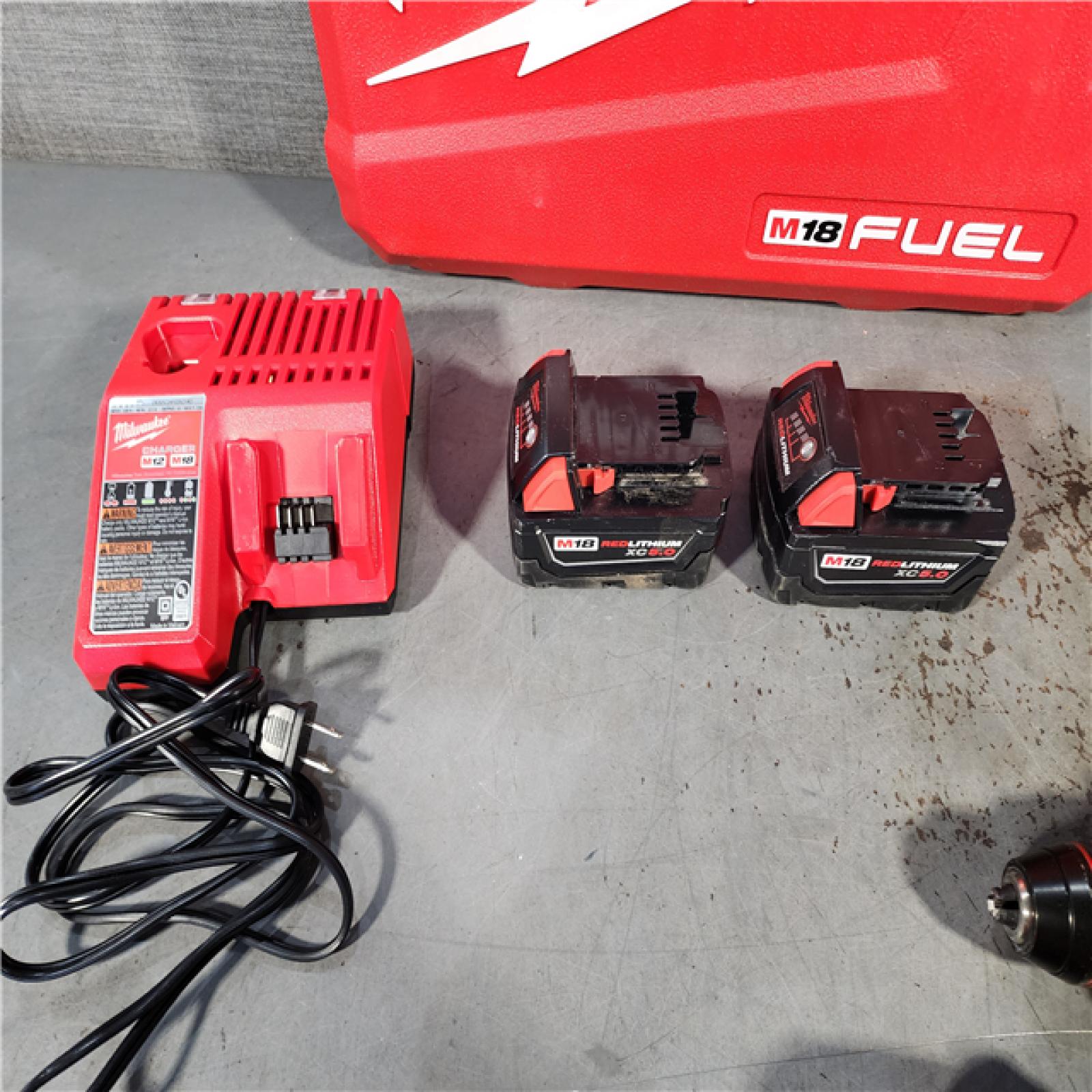 HOUSTON LOCATION - AS-IS Milwaukee M18 FUEL 18V Lithium-Ion Brushless Cordless Hammer Drill and Impact Driver Combo Kit (2-Tool) with 2 Batteries