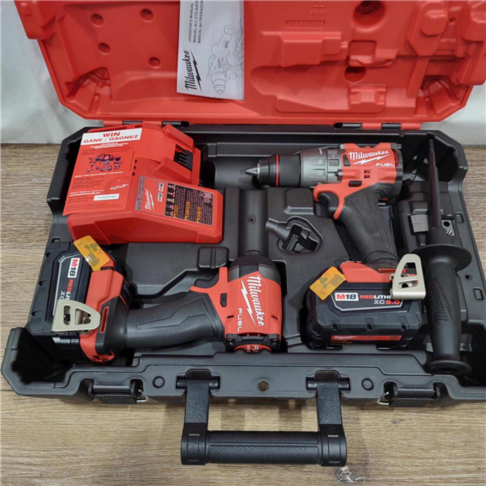 AS-IS M18 FUEL 18V Lithium-Ion Brushless Cordless Hammer Drill and Impact Driver Combo Kit (2-Tool) with 2 Batteries