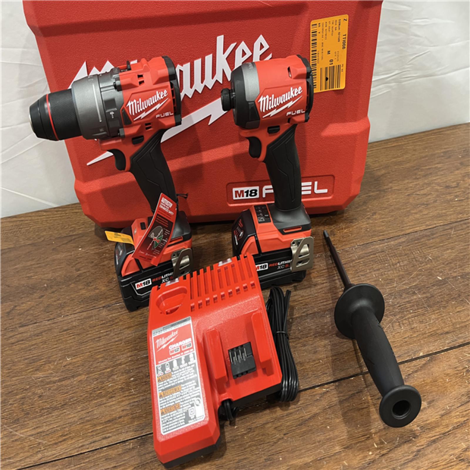 AS-IS Milwaukee M18 FUEL 18V Lithium-Ion Brushless Cordless Hammer Drill and Impact Driver Combo Kit (2-Tool) with 2 Batteries