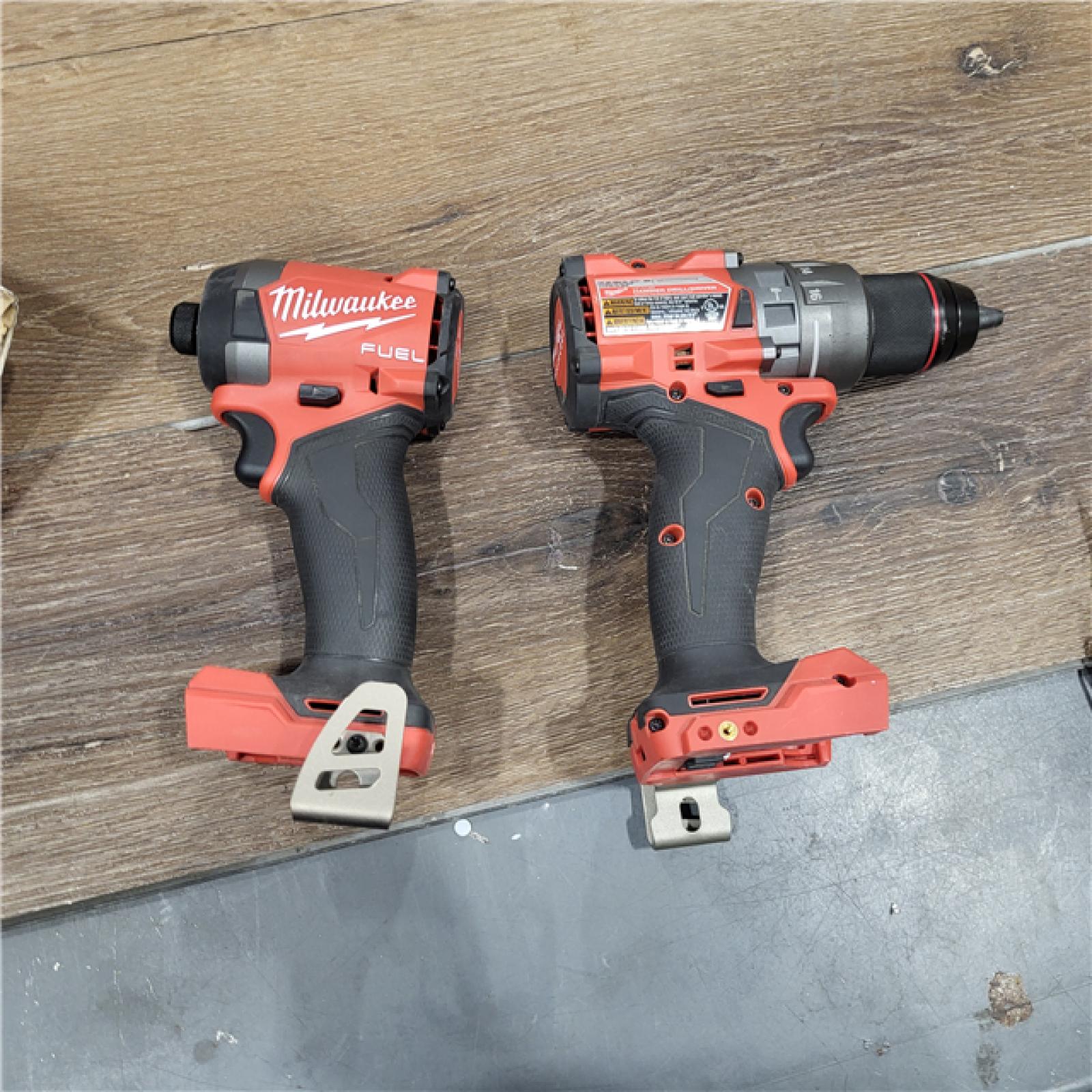 AS-IS Milwaukee M18 FUEL 18V Lithium-Ion Brushless Cordless Hammer Drill and Impact Driver Combo Kit (2-Tool) with 2 Batteries