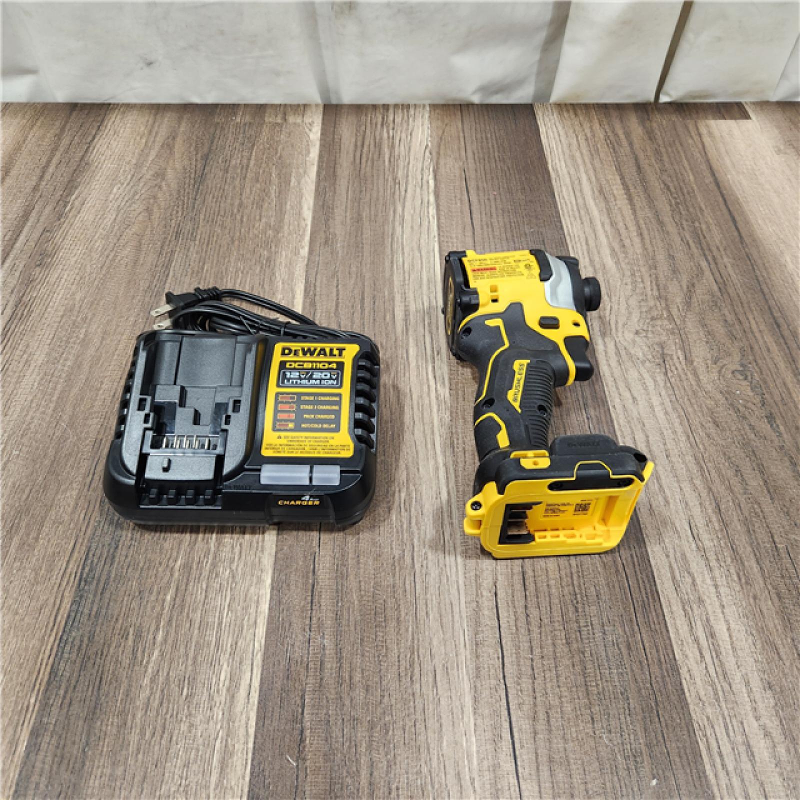 AS IS DEWALT ATOMIC 20V MAX Lithium-Ion Cordless 1/4 in. Brushless Impact Driver Kit, 5 Ah Battery, Charger, and Bag