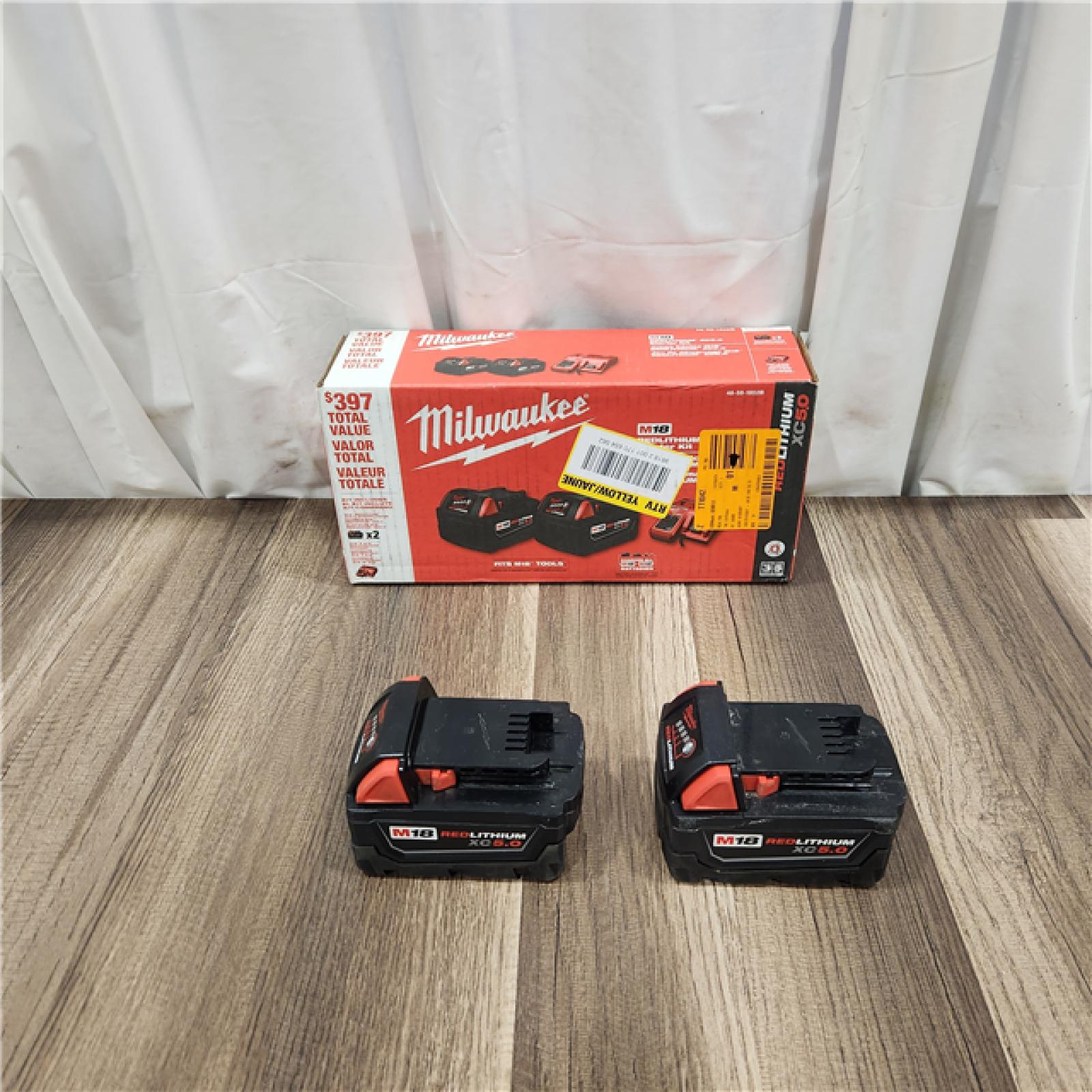 AS IS M18 18-Volt Lithium-Ion XC Starter Kit with Two 5.0Ah Batteries and Charger