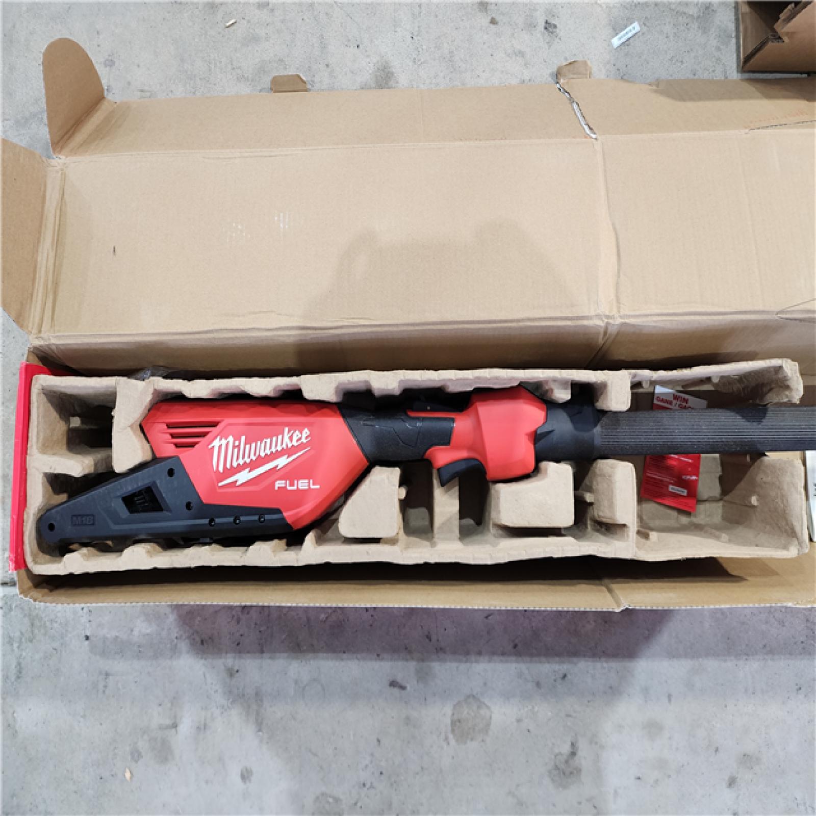 HOUSTON LOCATION - AS-IS (APPEARS LIKE NEW) Milwaukee M18 FUEL 10 in. 18V Lithium-Ion Brushless Electric Cordless Telescoping Pole Saw, 13 Ft. Length (Tool-Only)