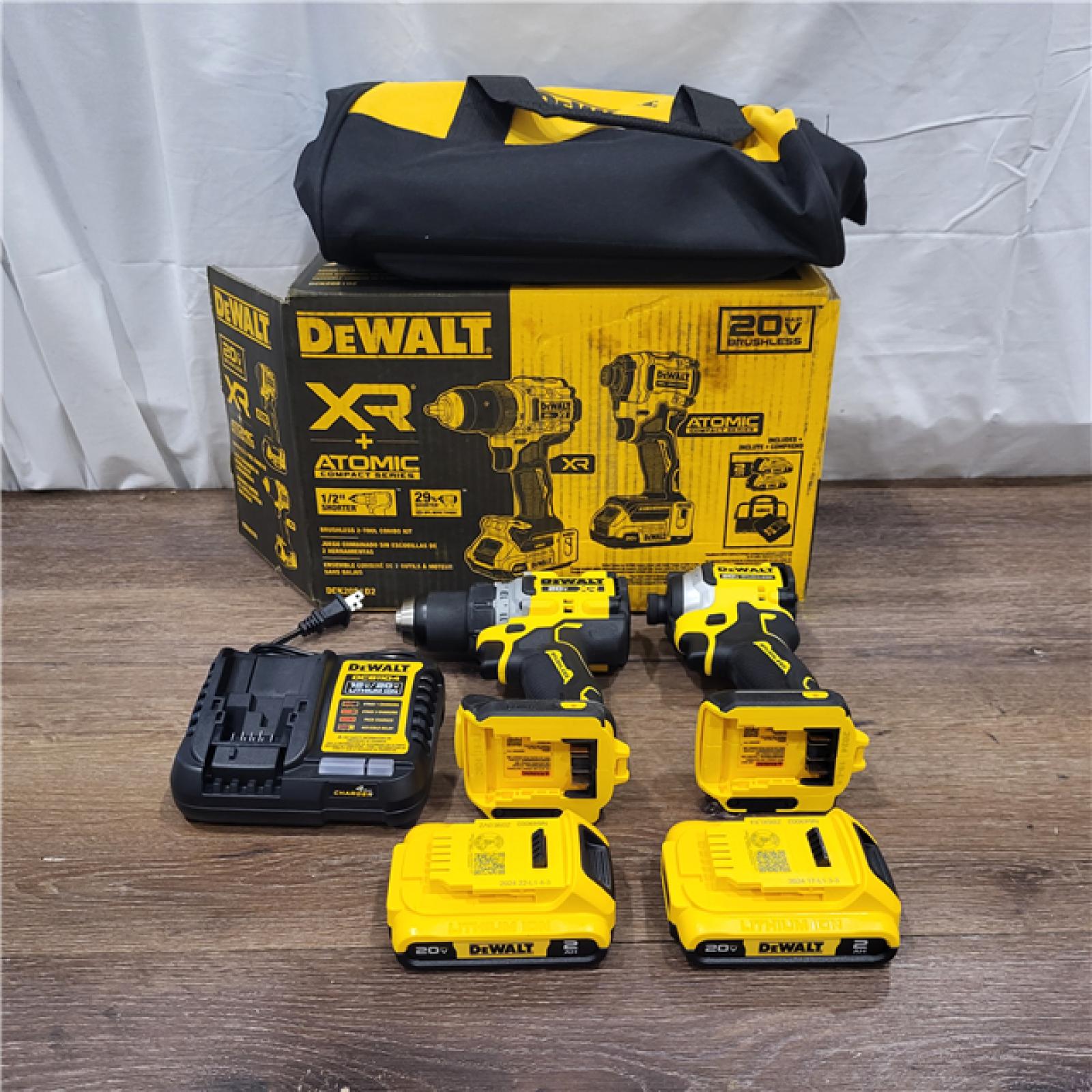 AS-IS DeWalt 20V MAX XR Cordless Drill/Driver, ATOMIC Impact Driver 2 Tool Combo Kit, (2) 2.0Ah Batteries, Charger, and Bag