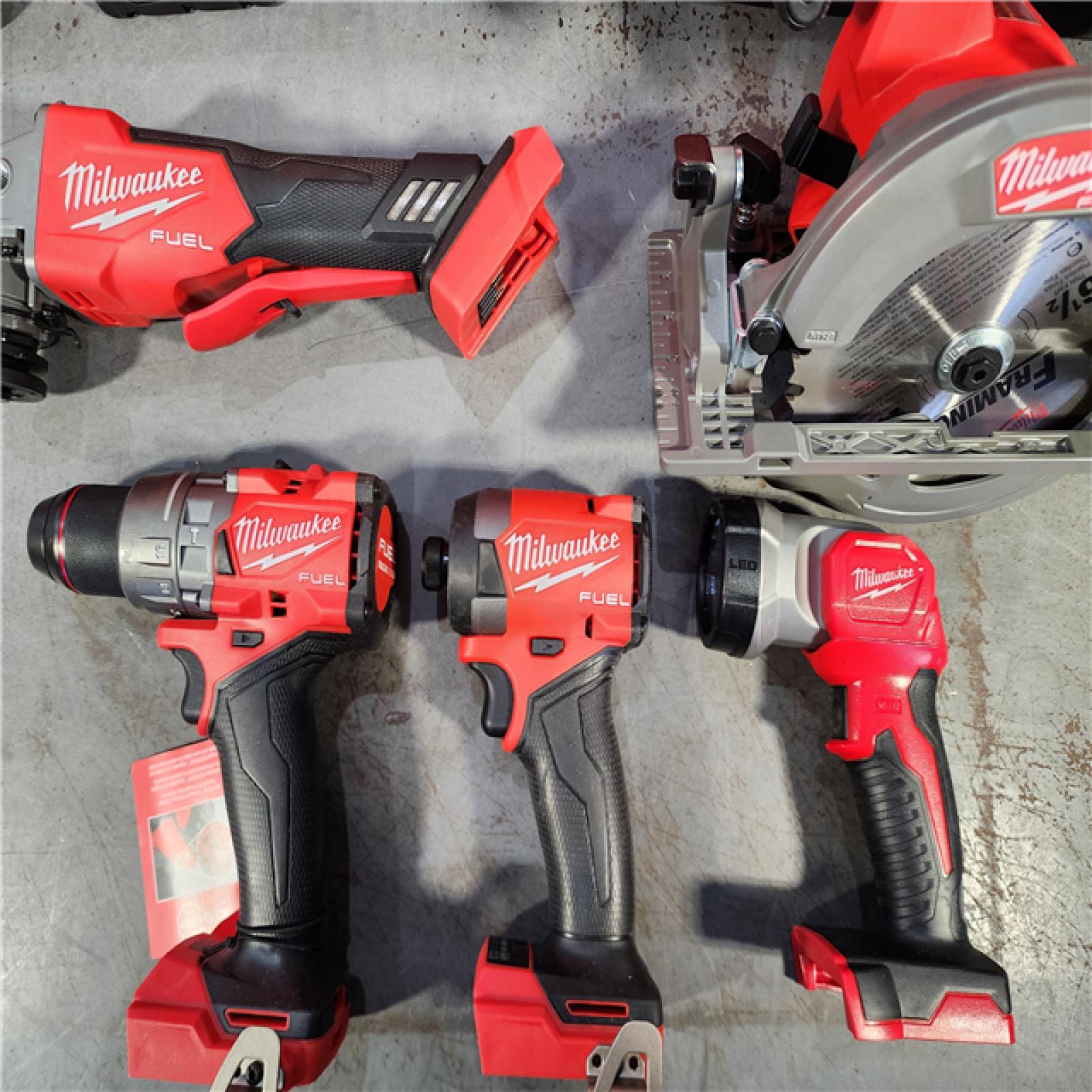 HOUSTON LOCATION - AS-IS (APPEARS LIKE NEW) M18 18-Volt Lithium-Ion Brushless Cordless FUEL Combo Kit (5-Tool) with 2-Batteries, 1-Charger, and Tool Bag