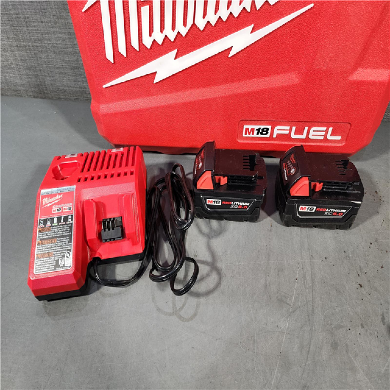 HOUSTON LOCATION - AS-IS Milwaukee M18 FUEL 18V Lithium-Ion Brushless Cordless Hammer Drill and Impact Driver Combo Kit (2-Tool) with 2 Batteries