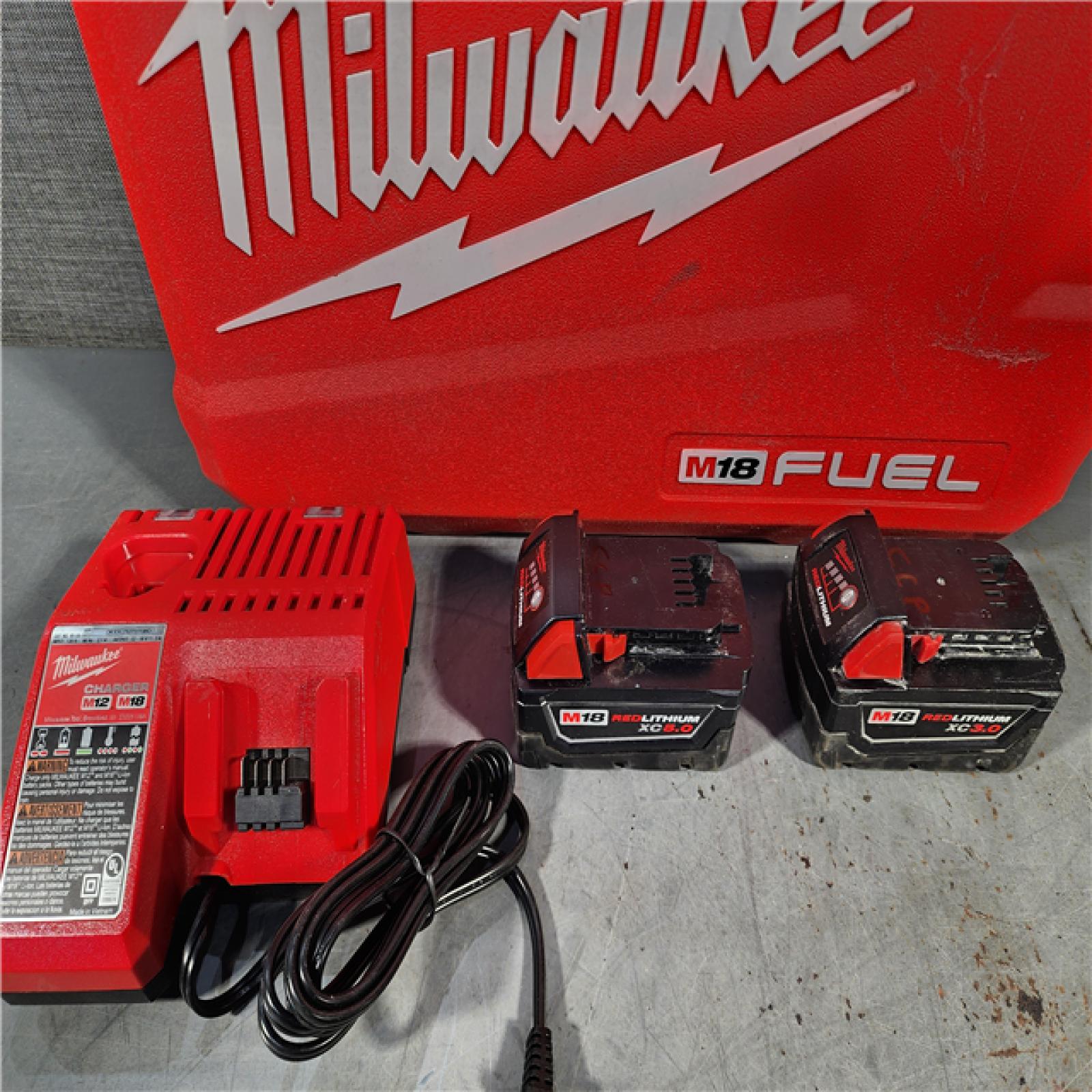 HOUSTON LOCATION - AS-IS Milwaukee M18 FUEL 18V Lithium-Ion Brushless Cordless Hammer Drill and Impact Driver Combo Kit (2-Tool) with 2 Batteries