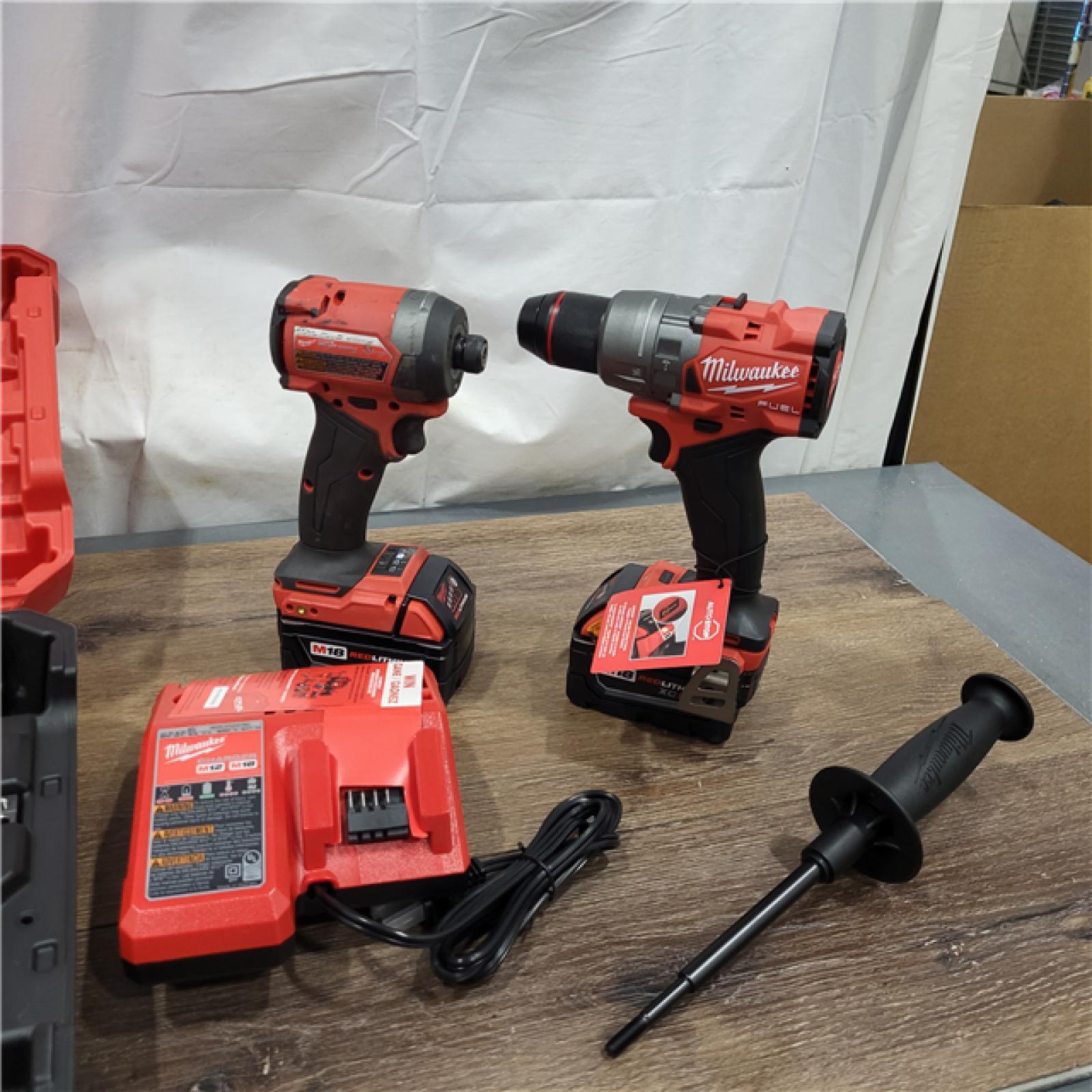 AS-IS Milwaukee M18 FUEL 18V Lithium-Ion Brushless Cordless Hammer Drill and Impact Driver Combo Kit (2-Tool) with 2 Batteries