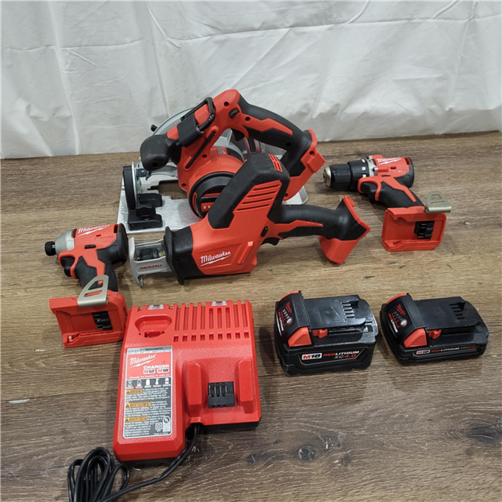 AS-IS M18 18-Volt Lithium-Ion Brushless Cordless Combo Kit (4-Tool) with 2-Batteries, 1-Charger and Tool Bag