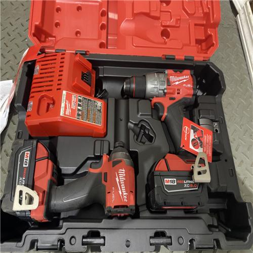 Houston location AS-IS Milwaukee 3697-22 M18 FUEL 1/2 Hammer Driller/Driver &1/4 Hex Impact Driver 2 Tool Combo Kit