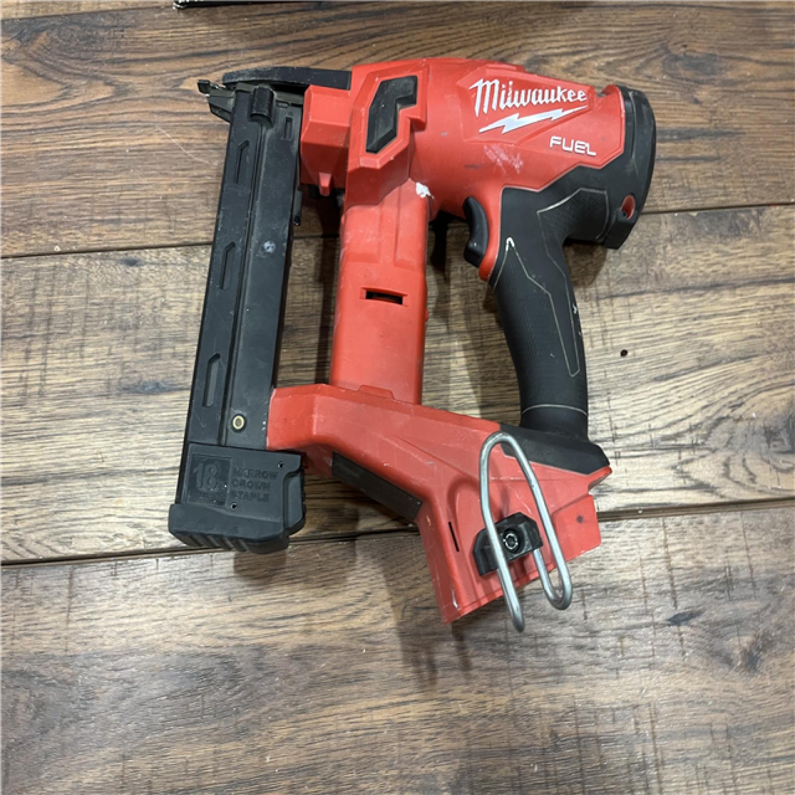 AS-IS MILWAUKEE M18 FUEL 18-Volt Lithium-Ion Brushless Cordless 18-Gauge 1/4 in. Narrow Crown Stapler (Tool-Only)